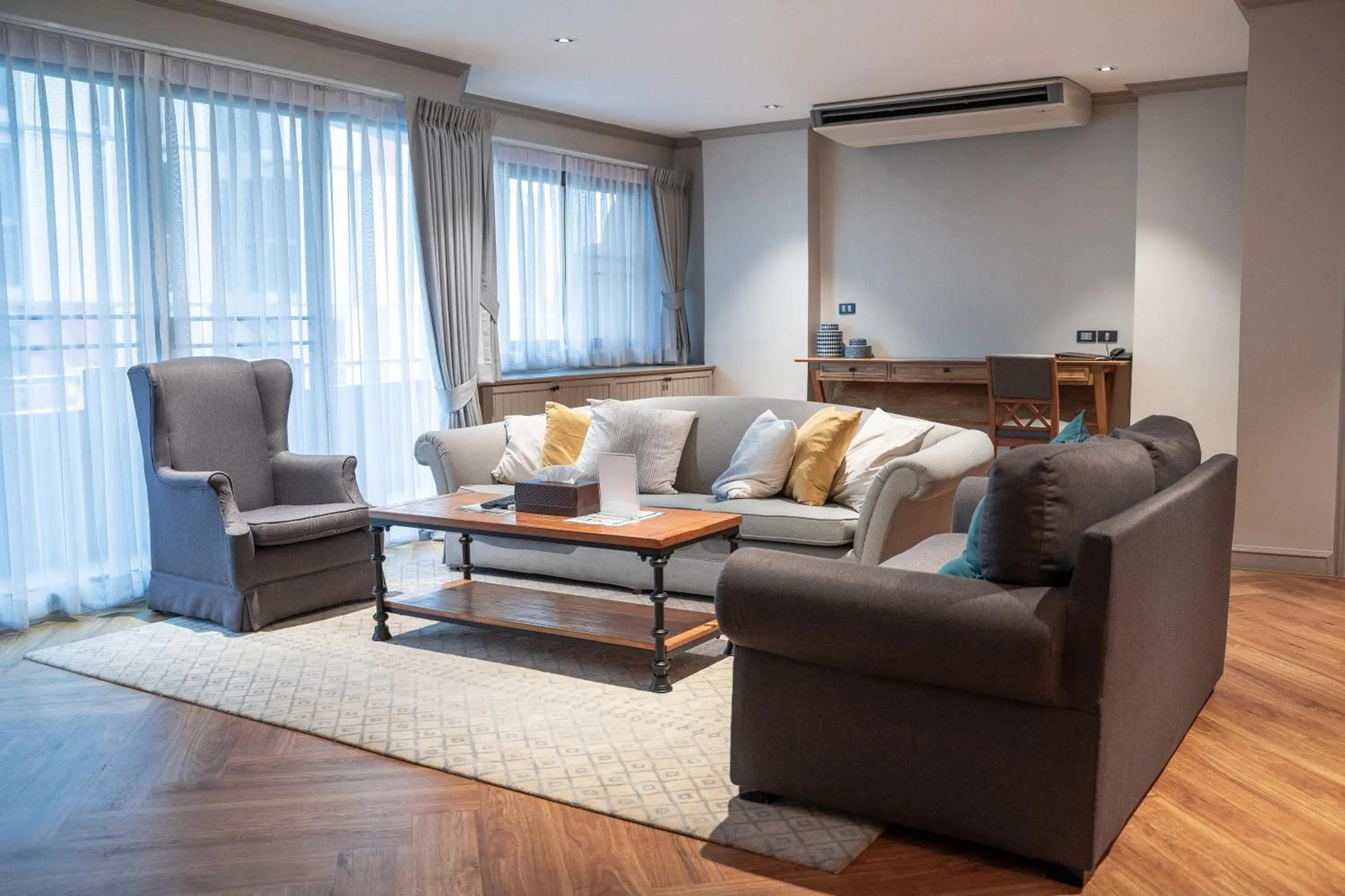 Living room in THEA Private Suites by TH District