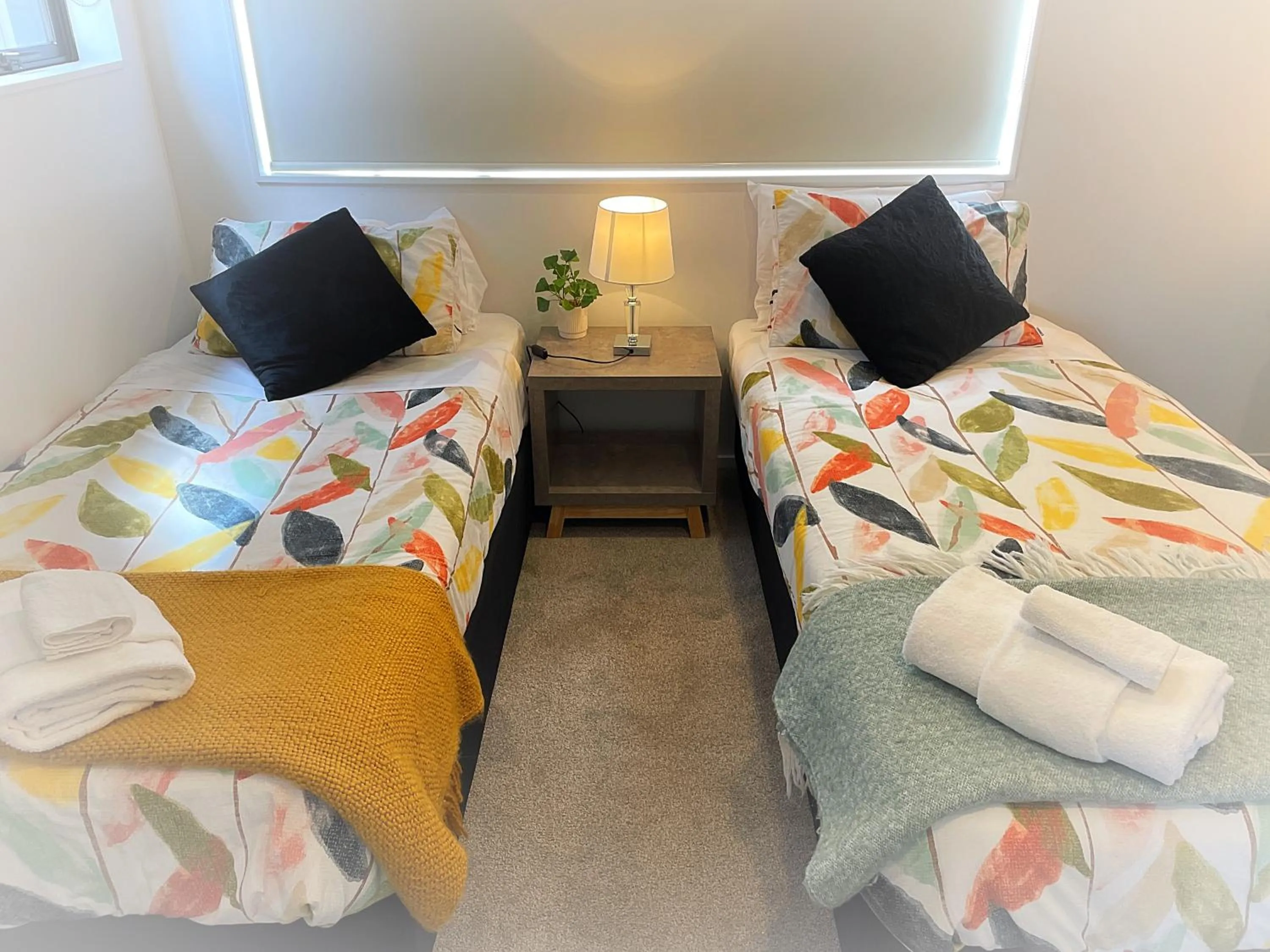 Bed in Flat Bush Holiday Accommodation