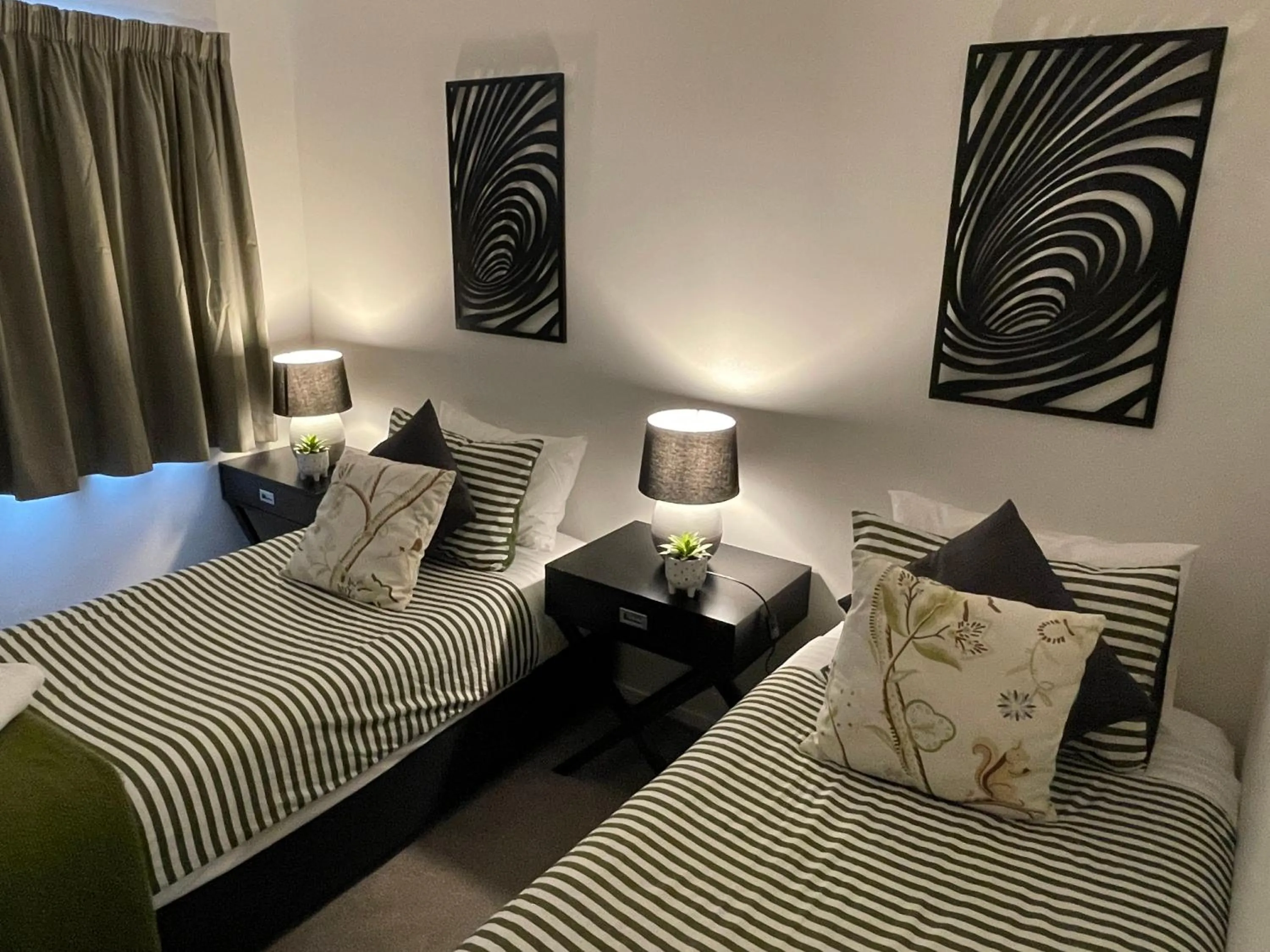 Bed in Flat Bush Holiday Accommodation