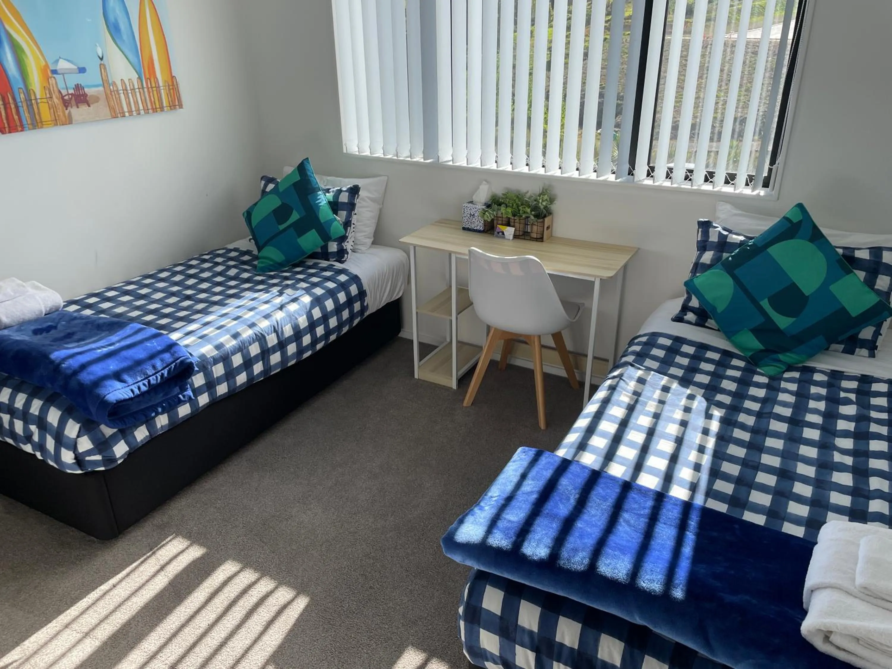 Bed in Flat Bush Holiday Accommodation