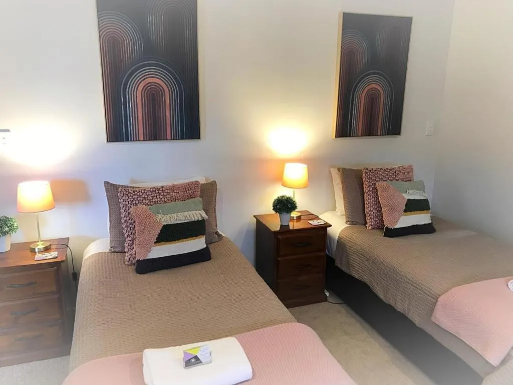 Bed in Flat Bush Holiday Accommodation