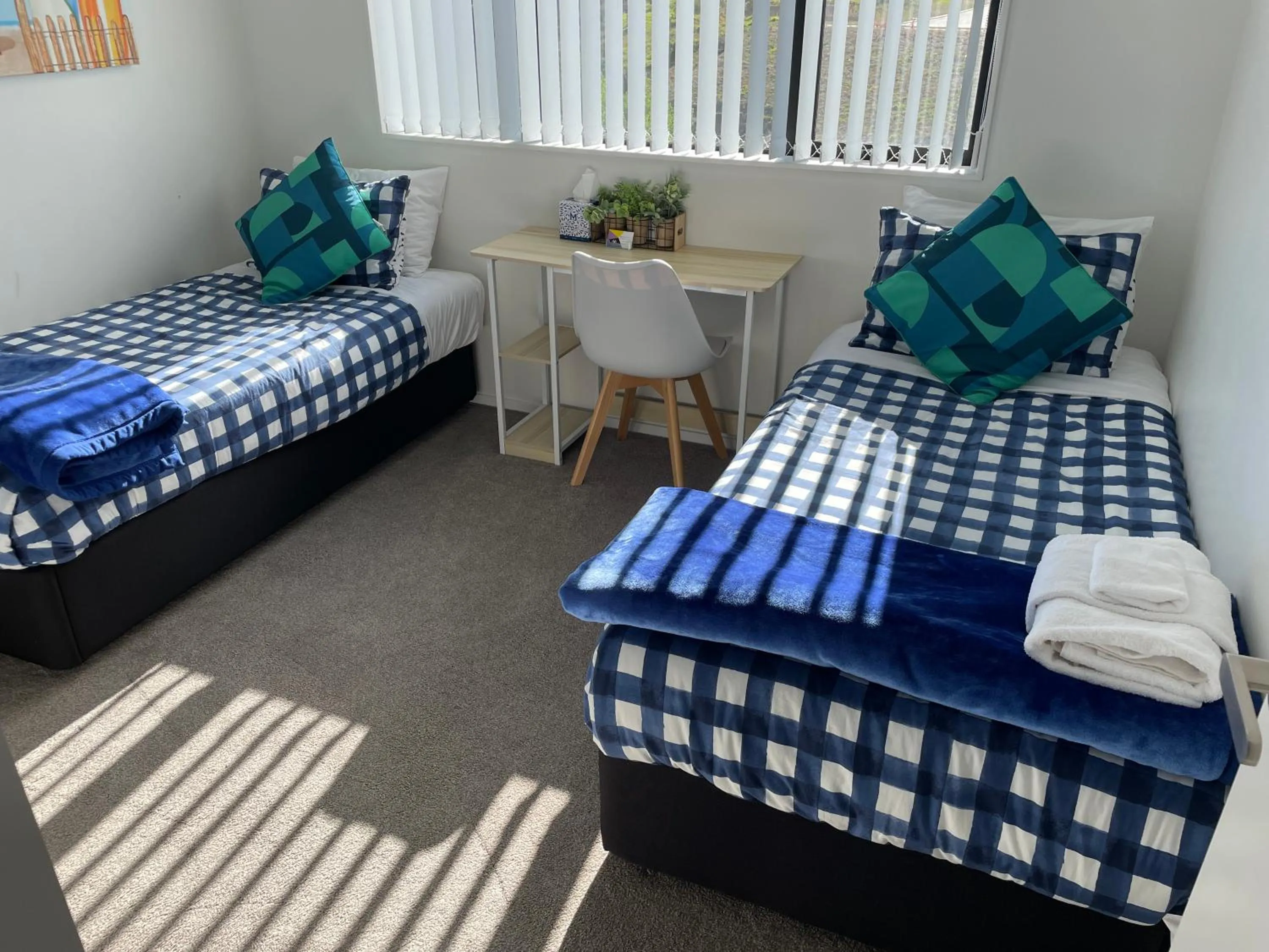 Bed in Flat Bush Holiday Accommodation