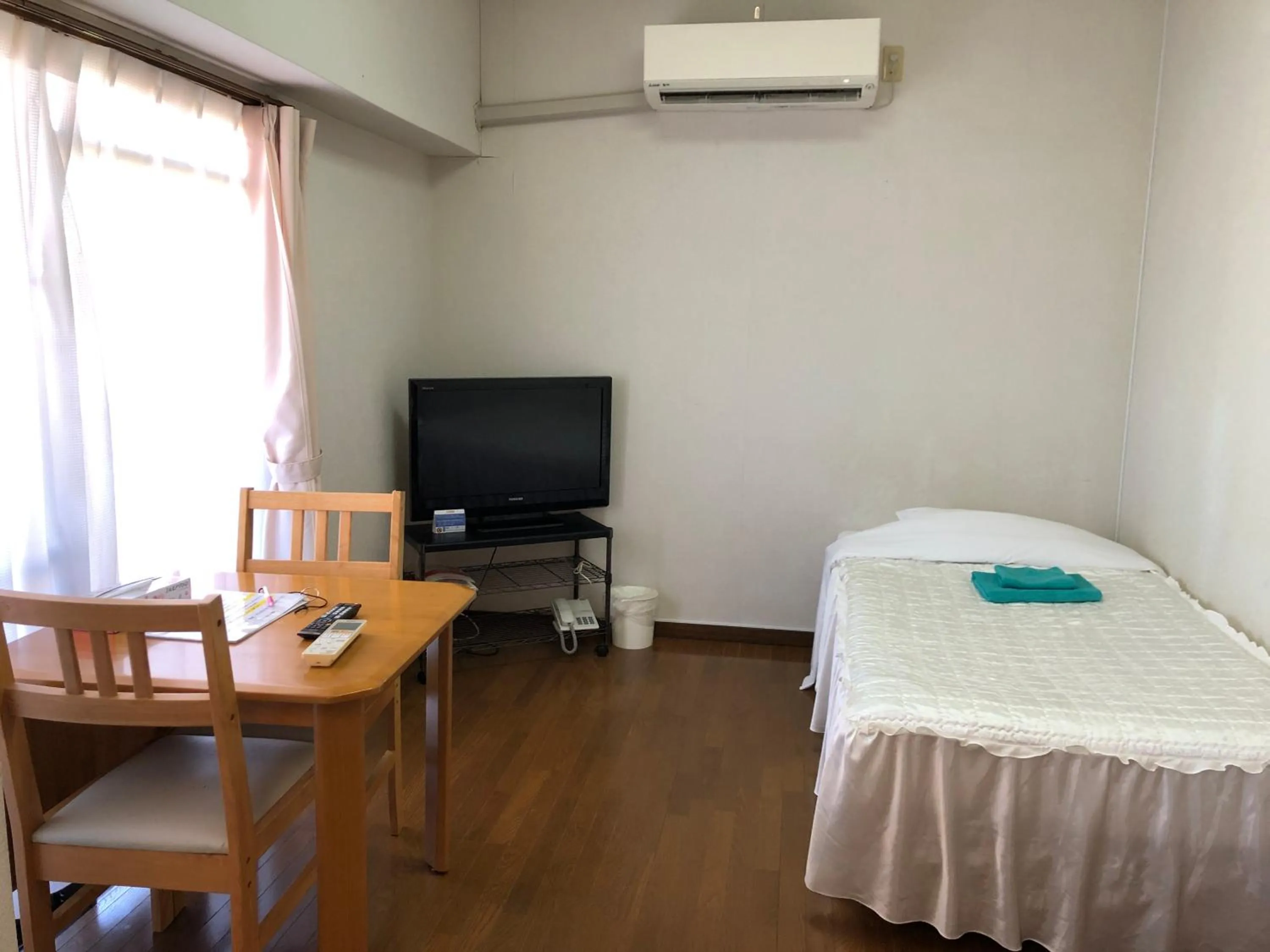 Bed in Weekly Harbourview Mansion Main Building