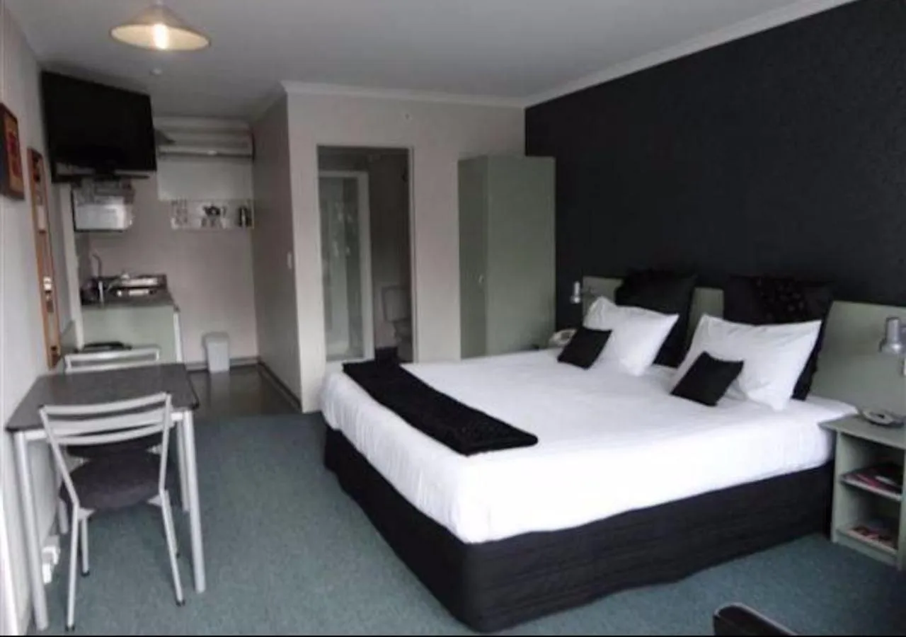 Bed in ASURE Abode On Courtenay Motor Inn