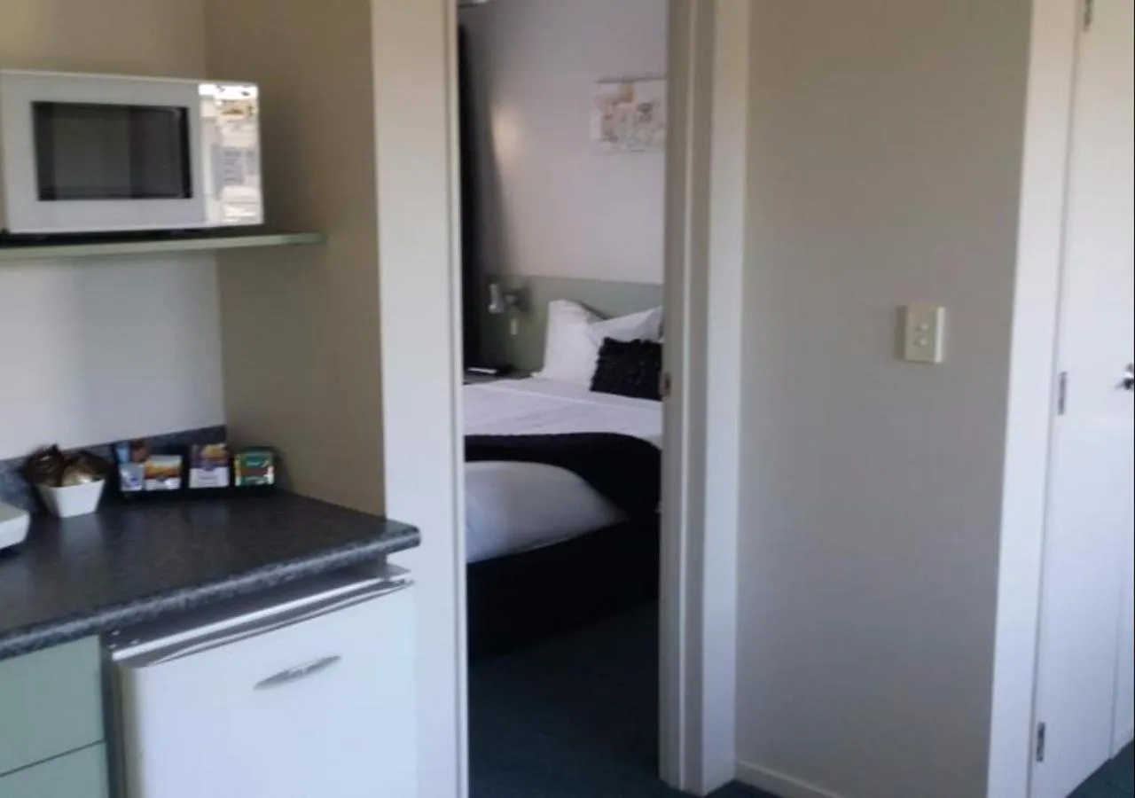 Bed in ASURE Abode On Courtenay Motor Inn