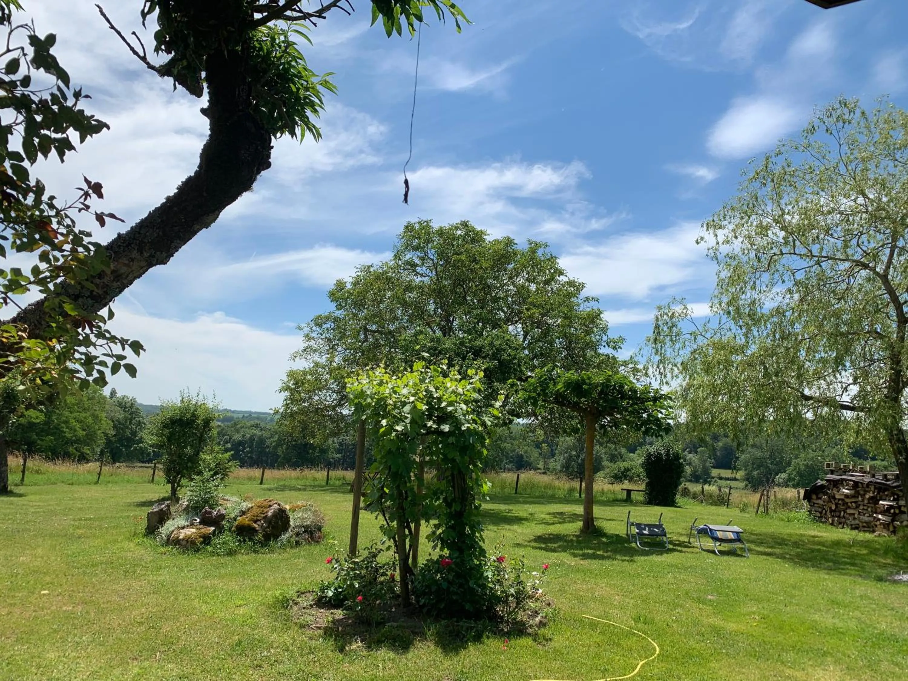 Garden view in CHAMBRES D' HOTES LA LISON