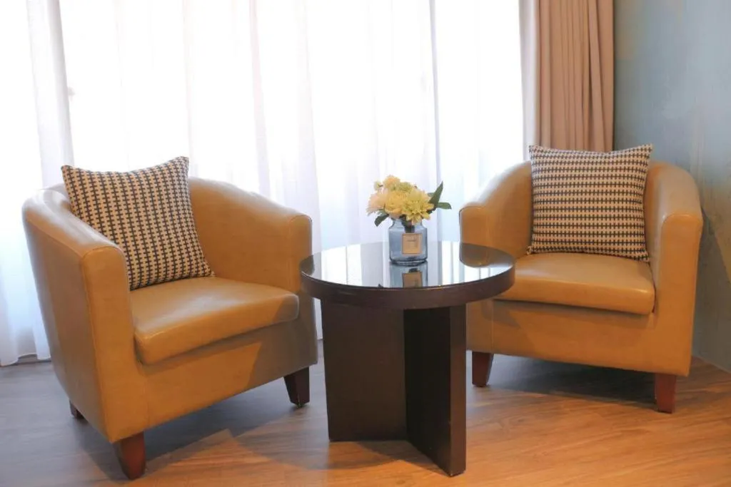 Seating area in Sky19 Hotel