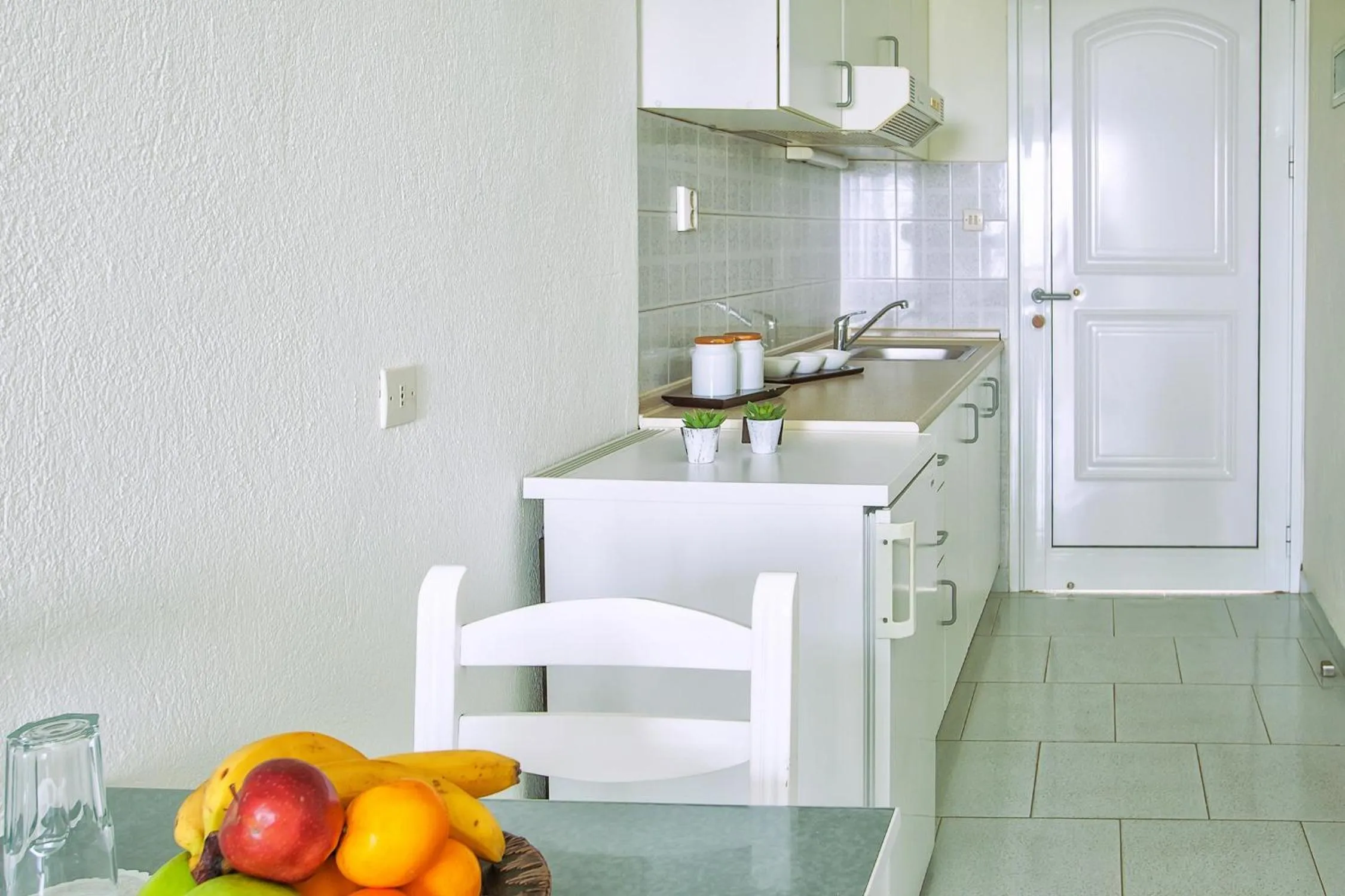 Kitchen or kitchenette in Xenios Port Marina Hotel