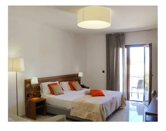 Bedroom in Morello Beach Hotel