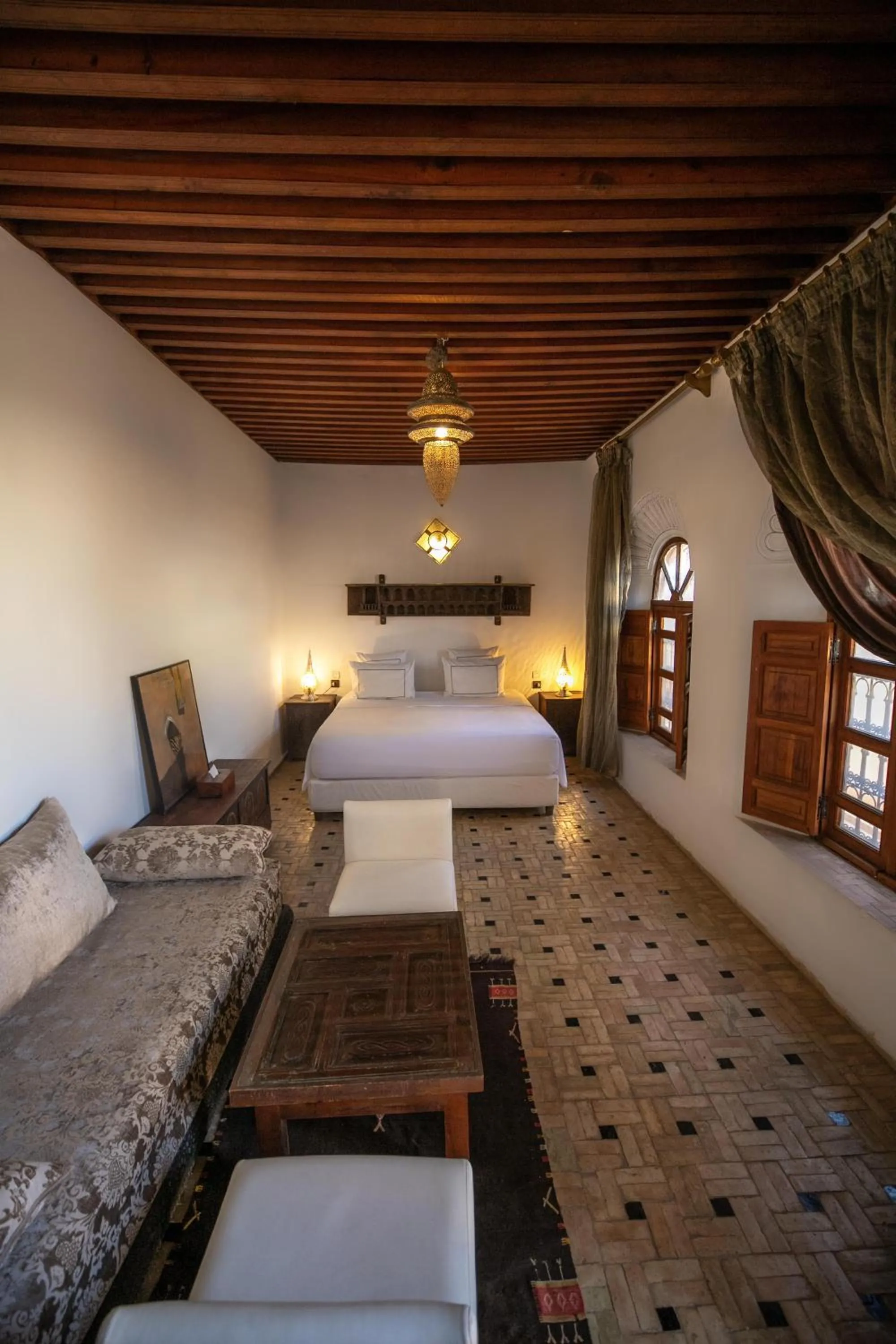 Living room, Bed in Riad Layla