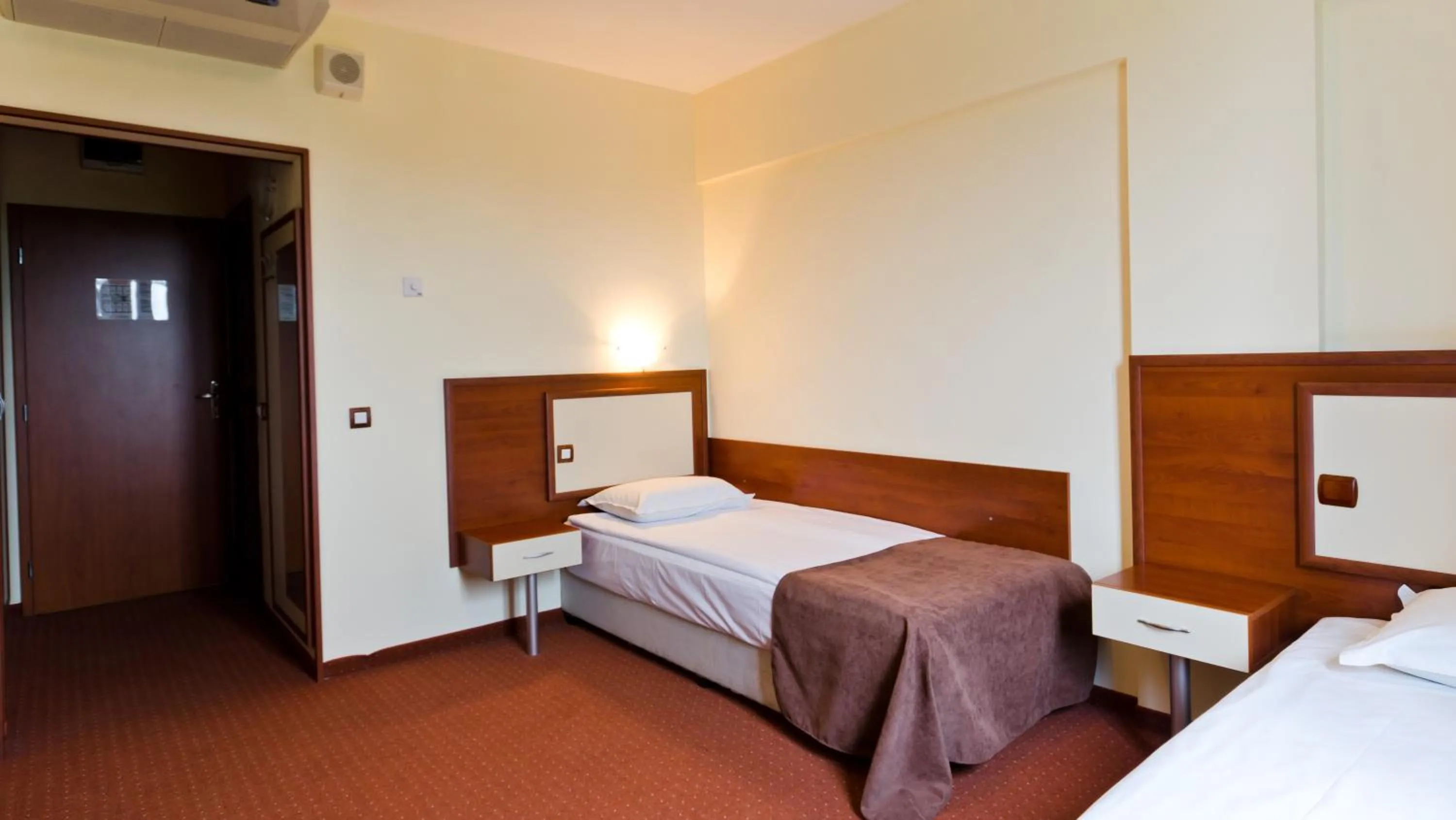 Bed in Nadejda Hotel