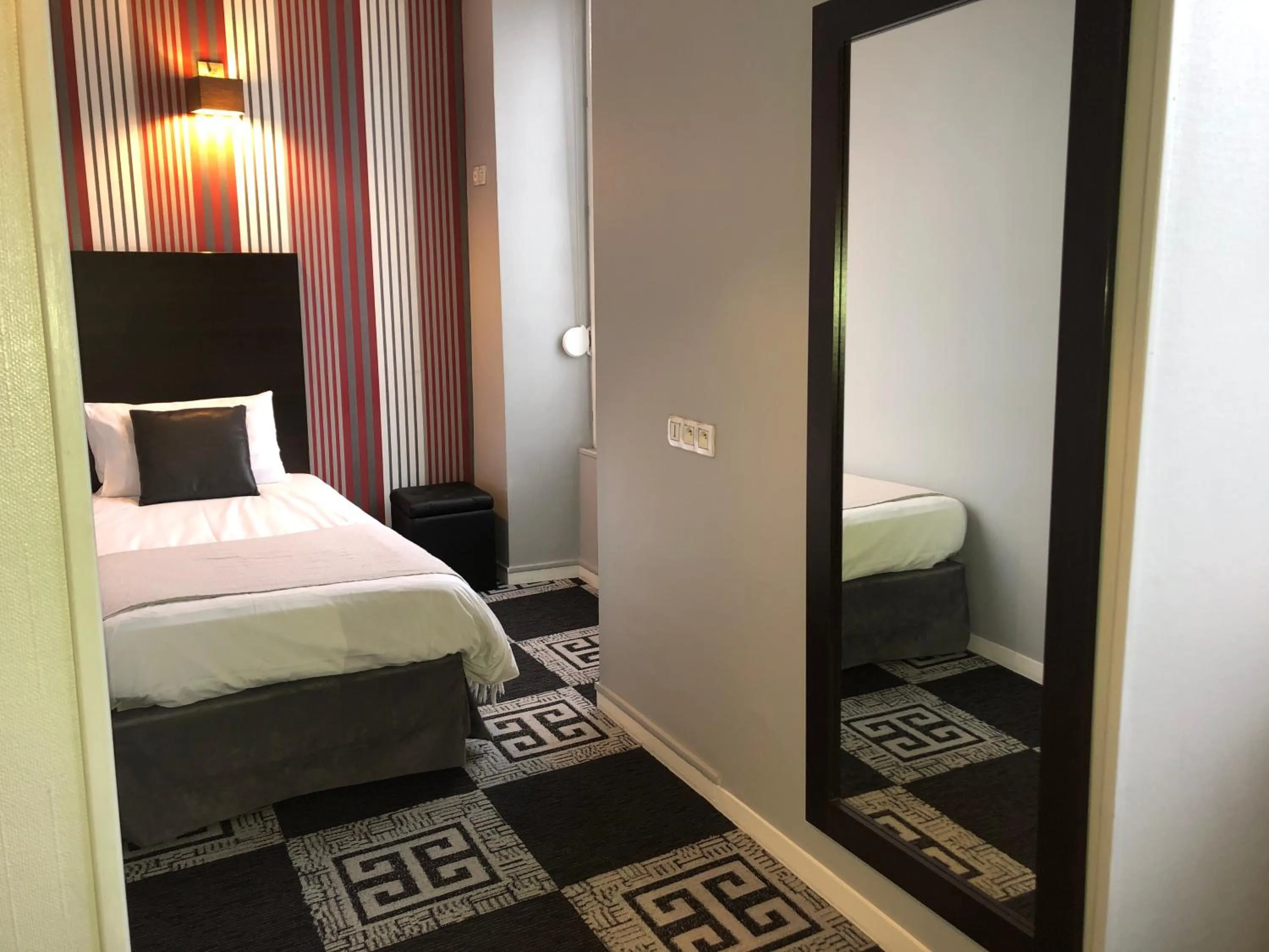 Bed in Logis Hotel - Le Charleston