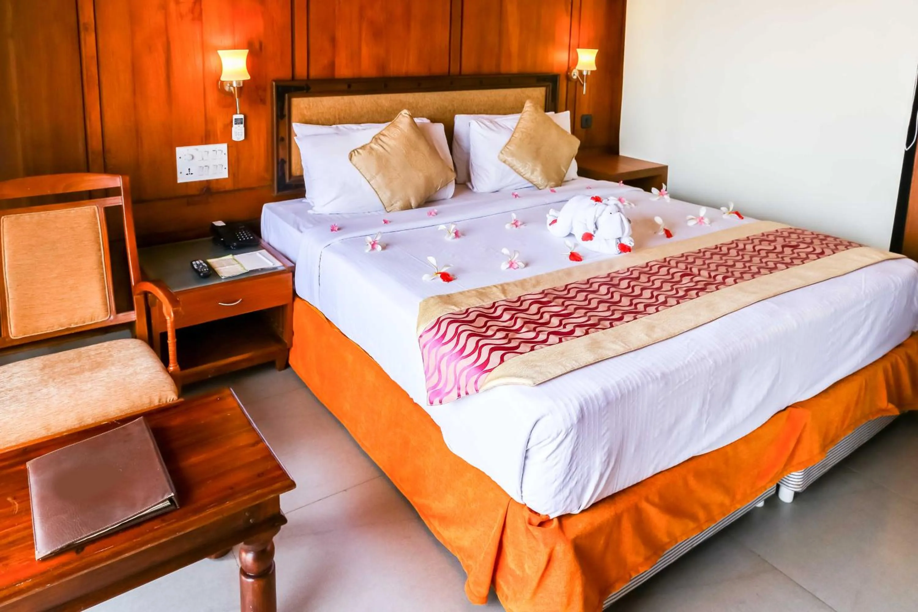 Bed in Poovar Island Resort
