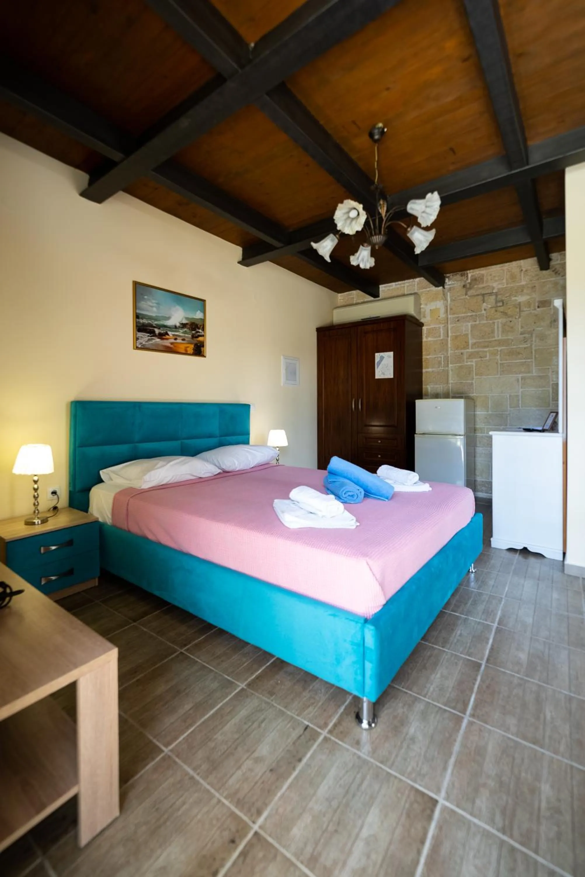 Bed in Ornella Beach Resort & Villas