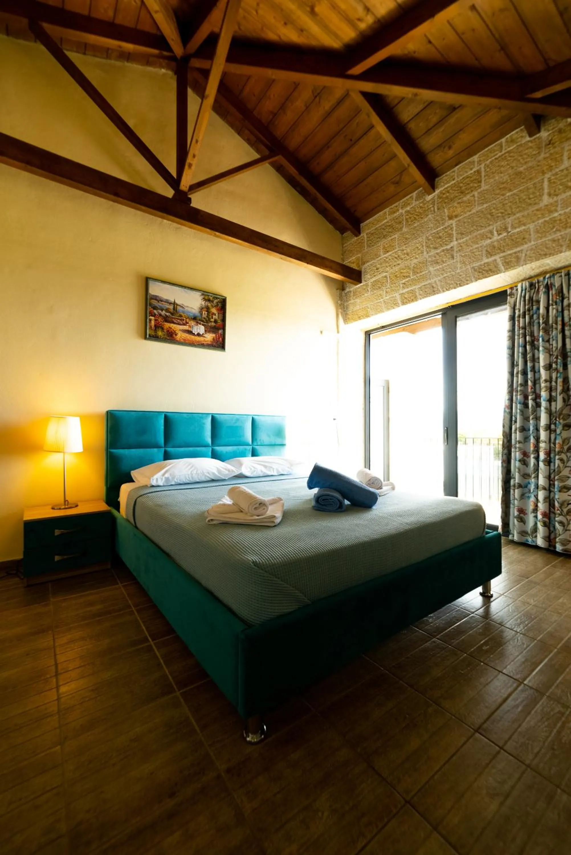 Bed in Ornella Beach Resort & Villas