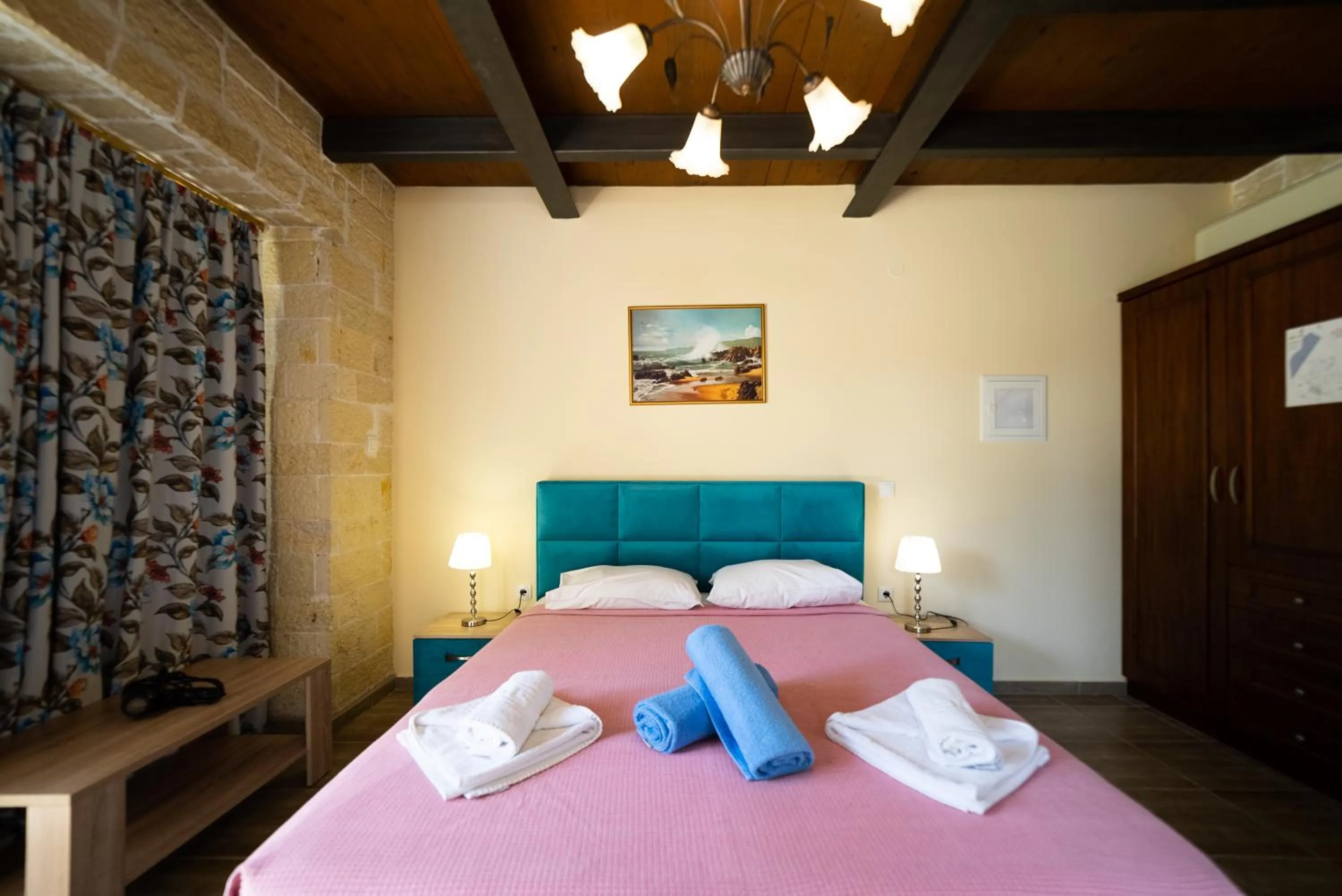 Bed in Ornella Beach Resort & Villas