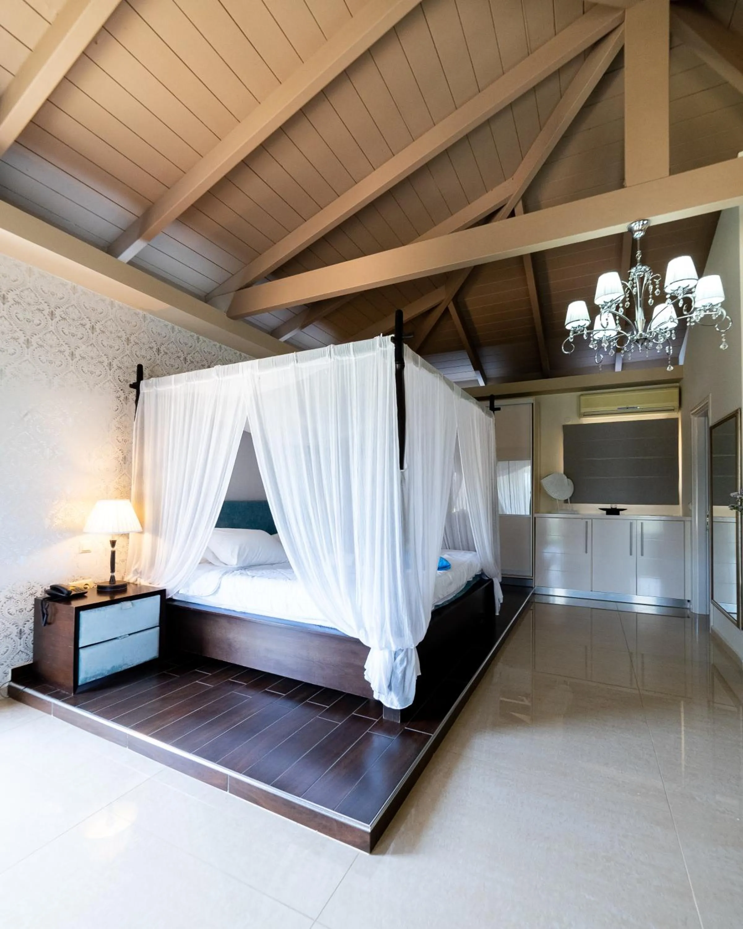 Bed in Ornella Beach Resort & Villas