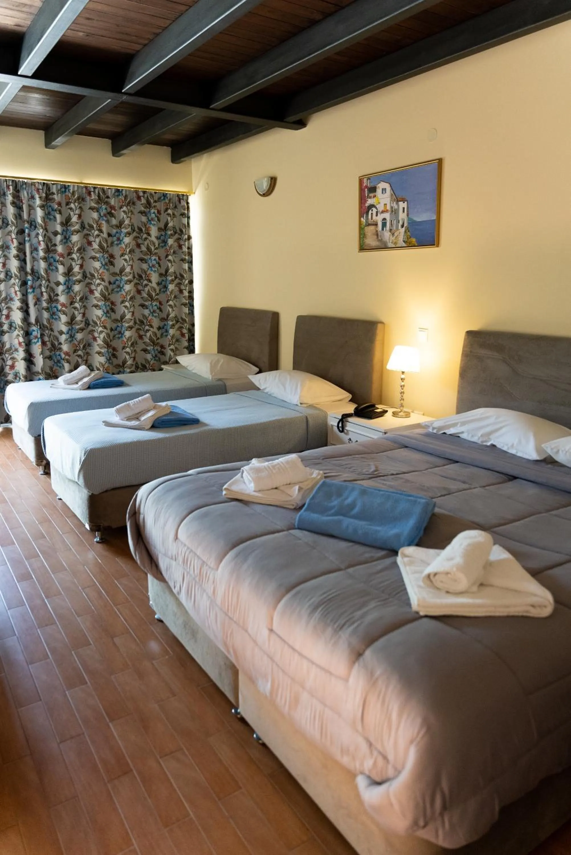 Bed in Ornella Beach Resort & Villas
