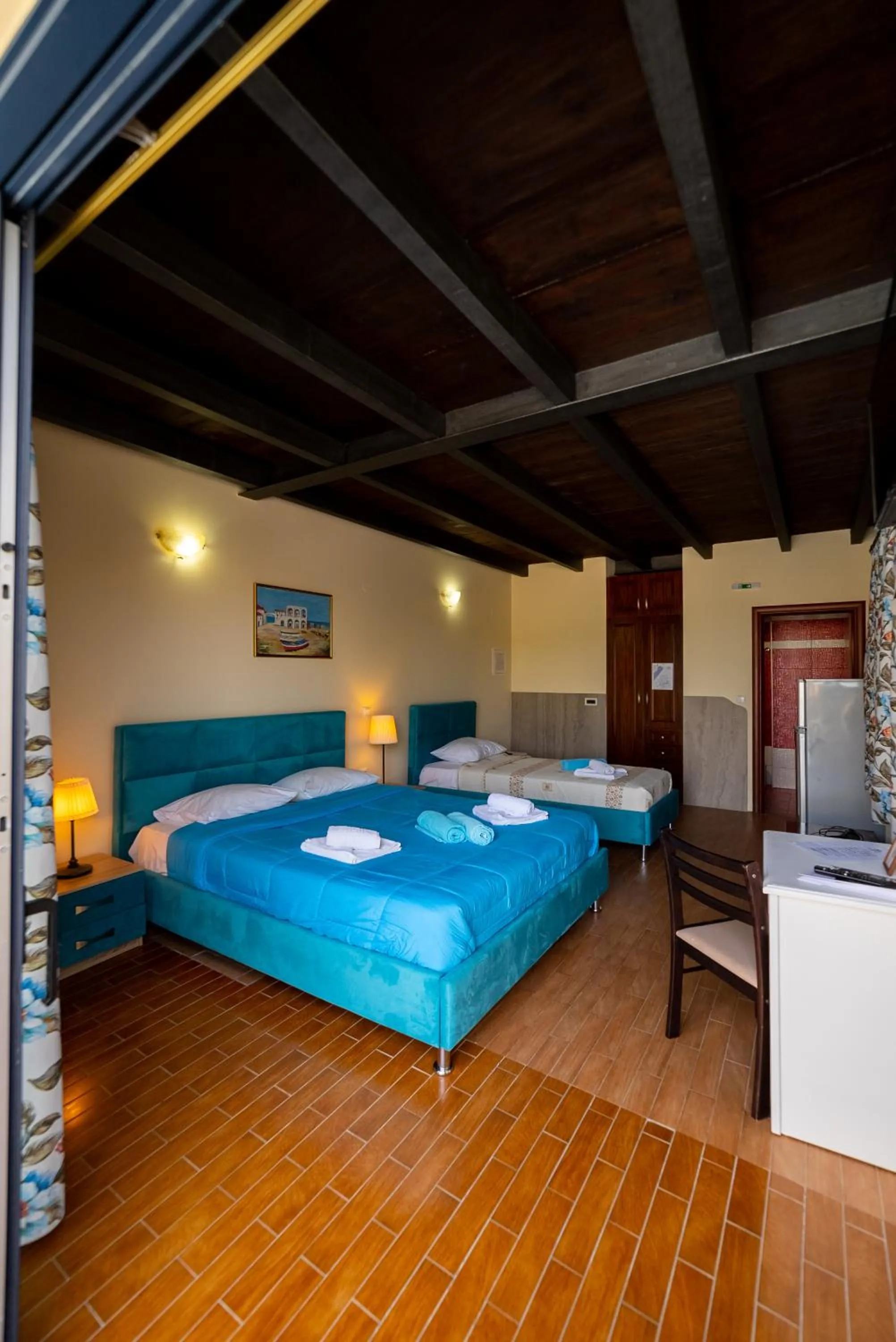 Bed in Ornella Beach Resort & Villas