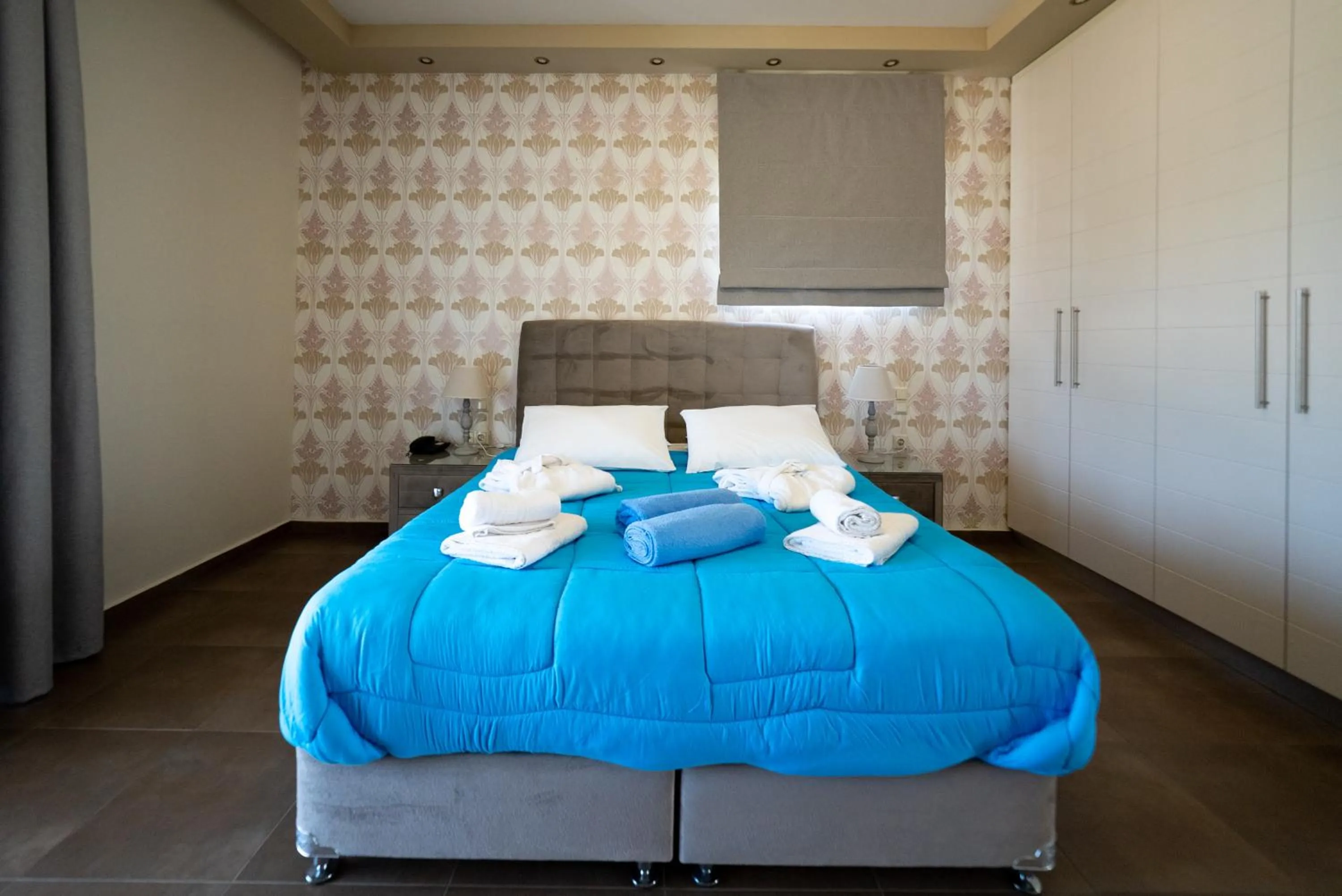 Bed in Ornella Beach Resort & Villas