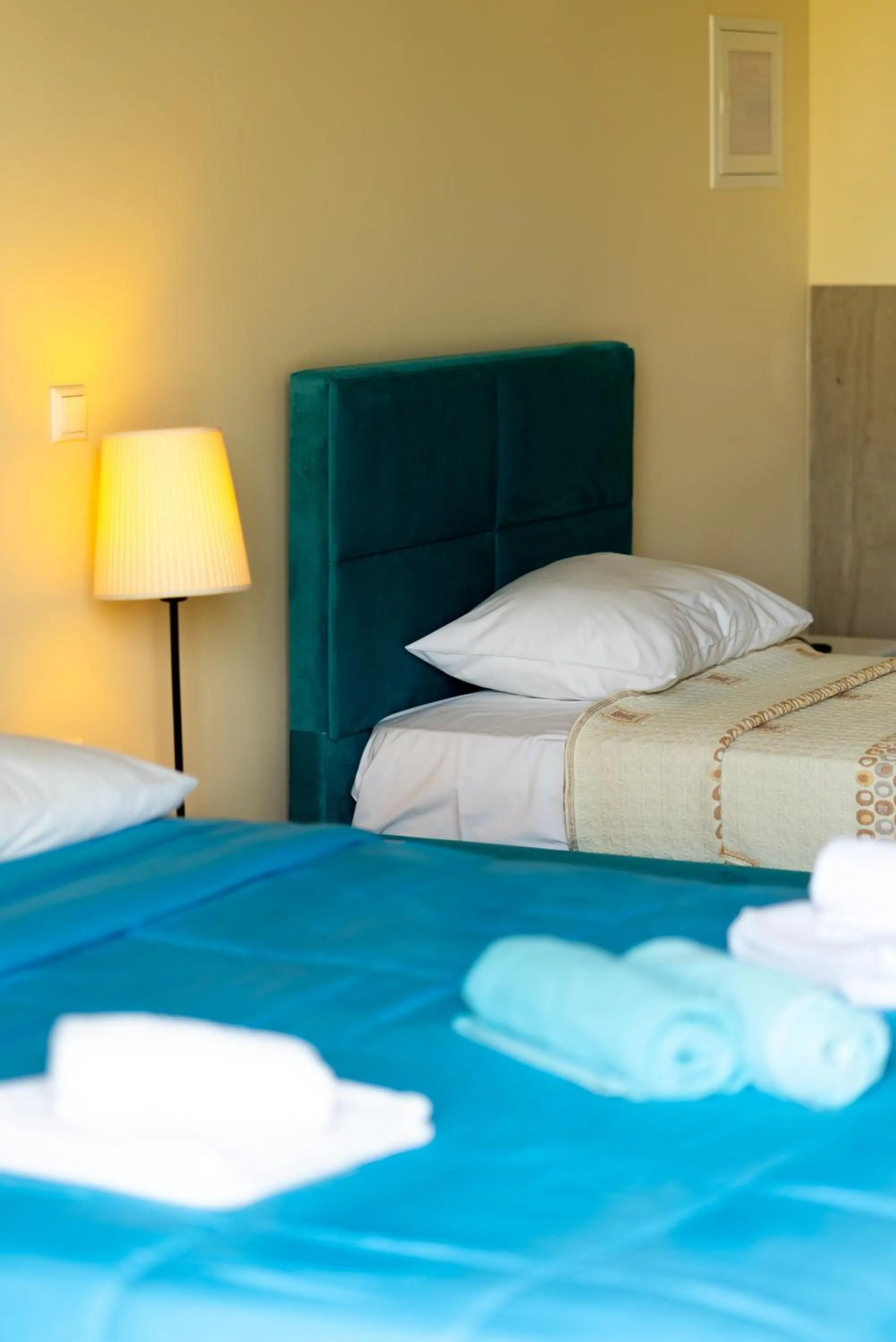Bed in Ornella Beach Resort & Villas