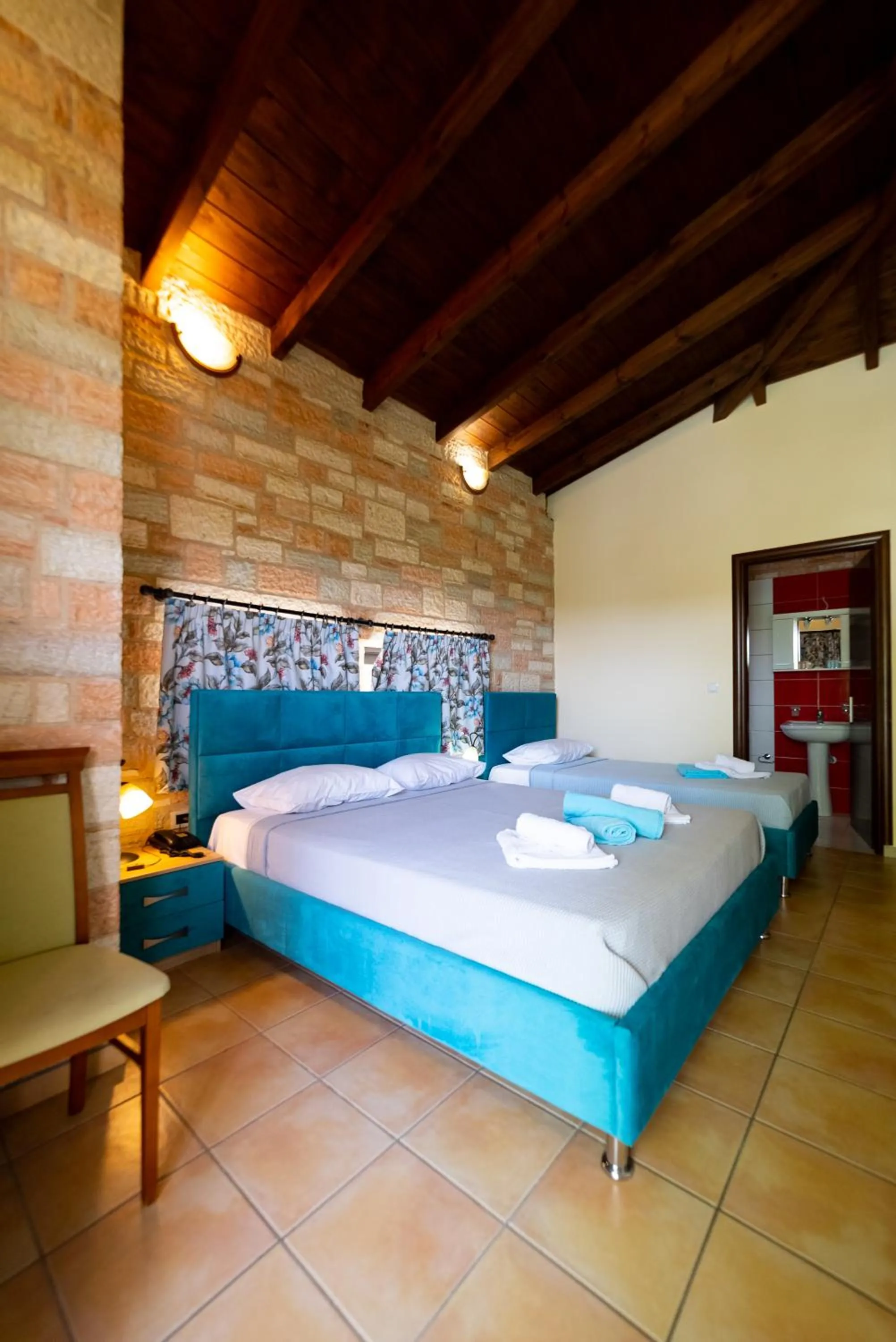 Bed in Ornella Beach Resort & Villas