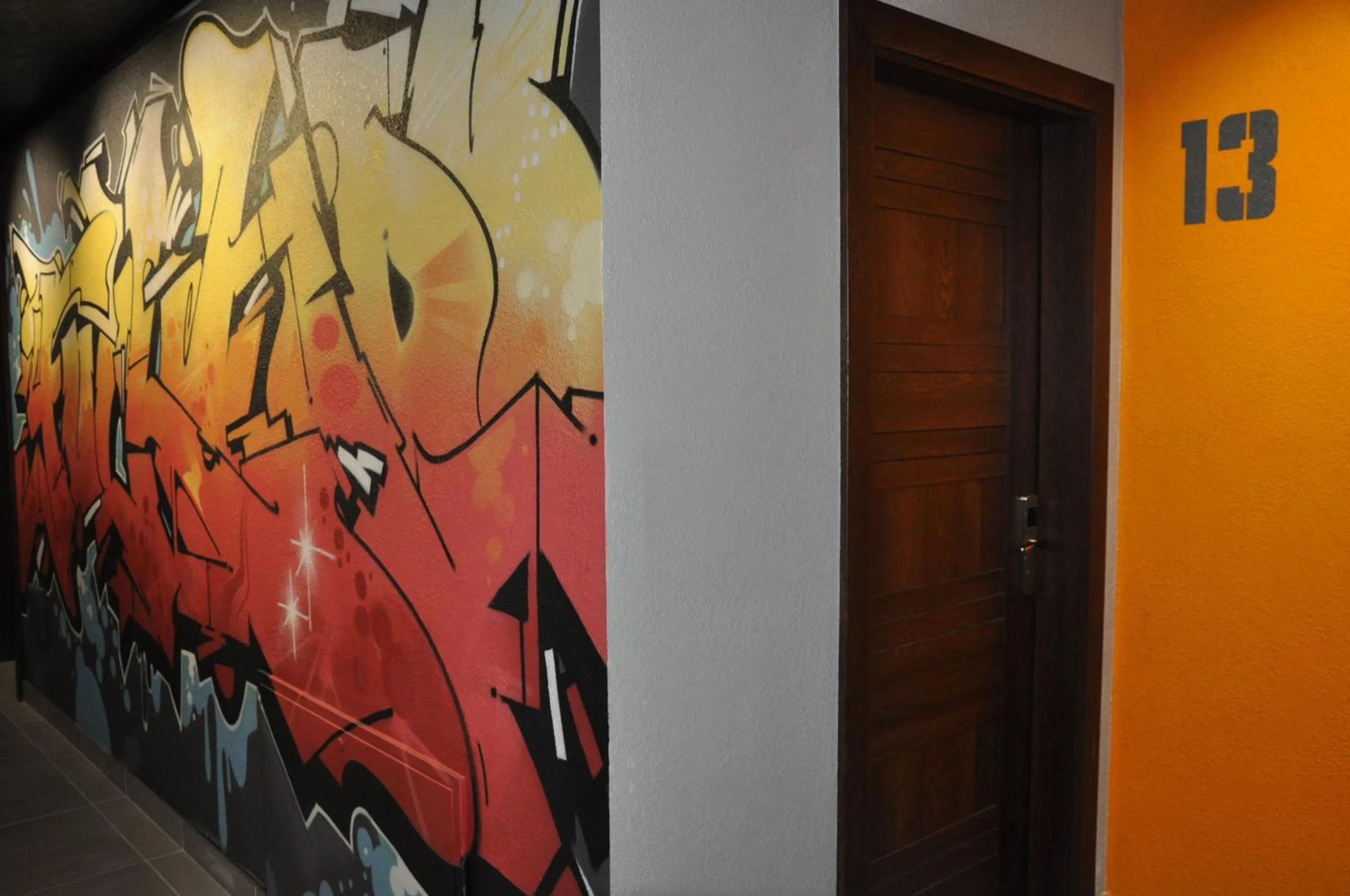 Facade/entrance in FULL HOUSE capsule hostel