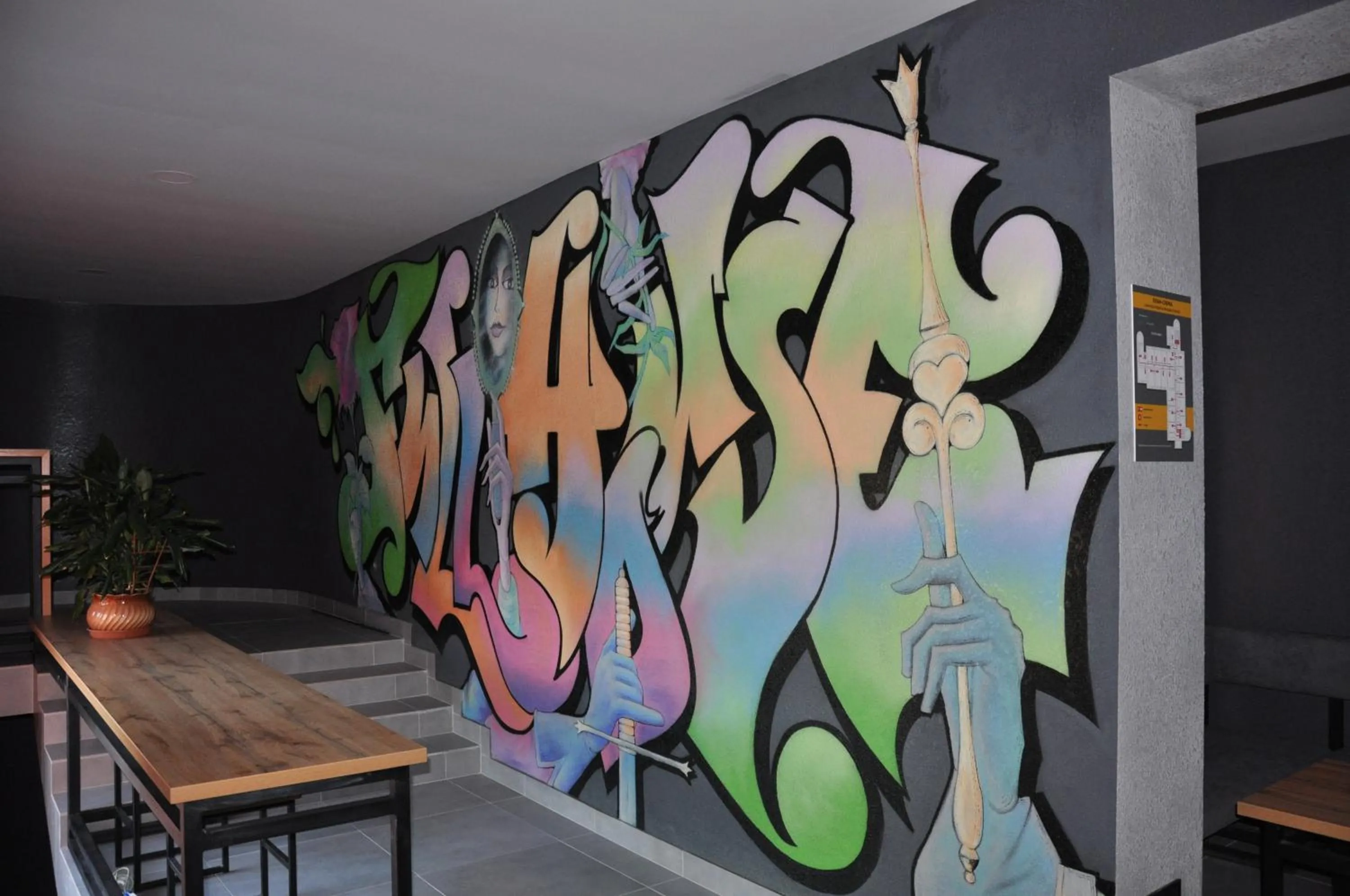 Dining area in FULL HOUSE capsule hostel
