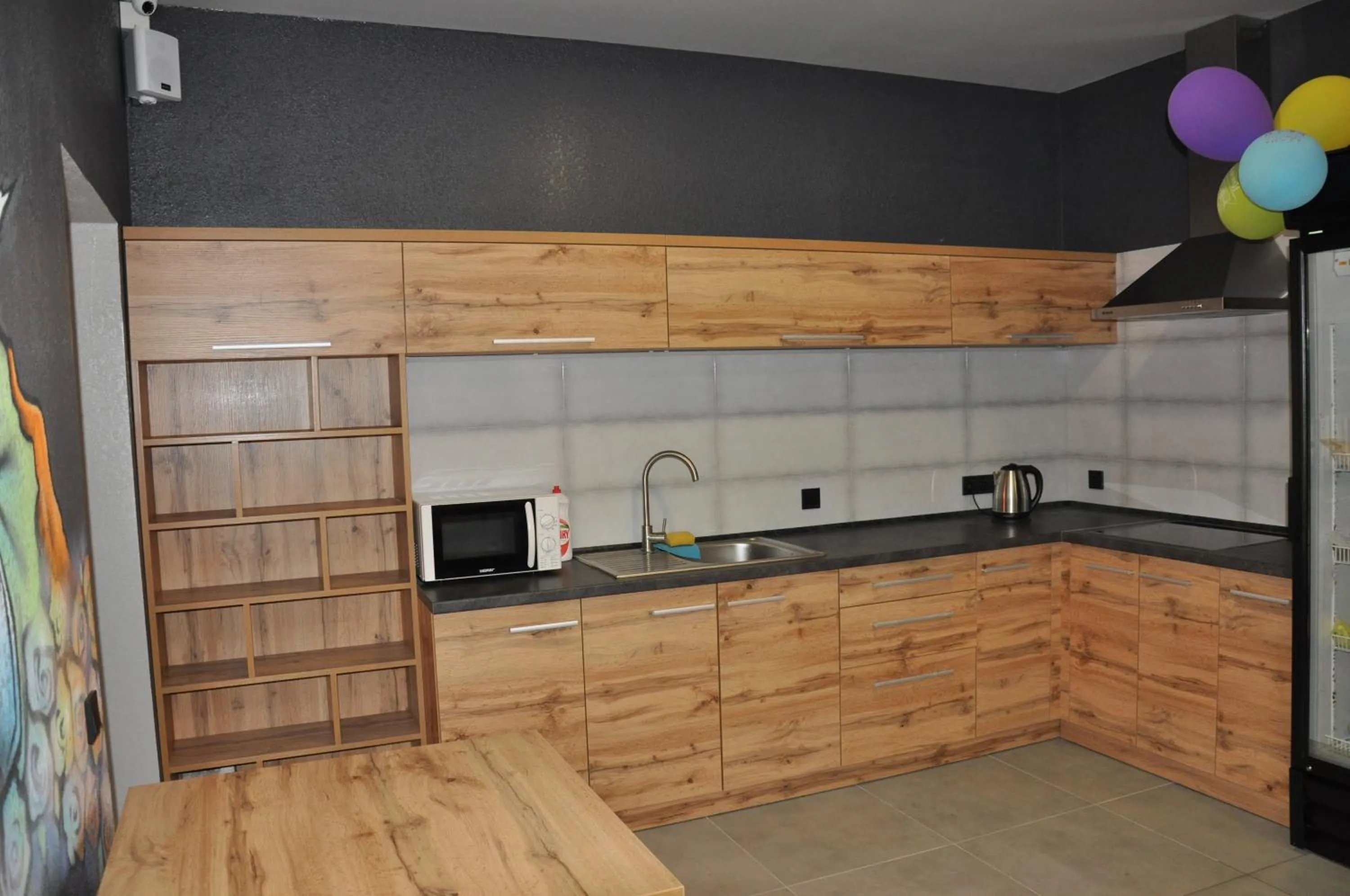 Kitchen or kitchenette in FULL HOUSE capsule hostel