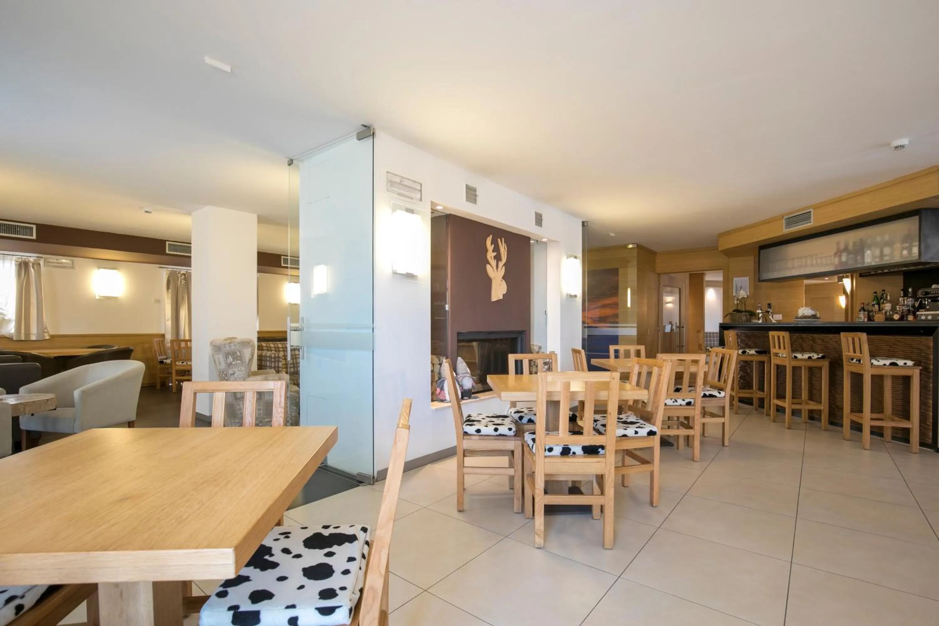 Communal lounge/ TV room in Hotel Luna Bianca Folgaria