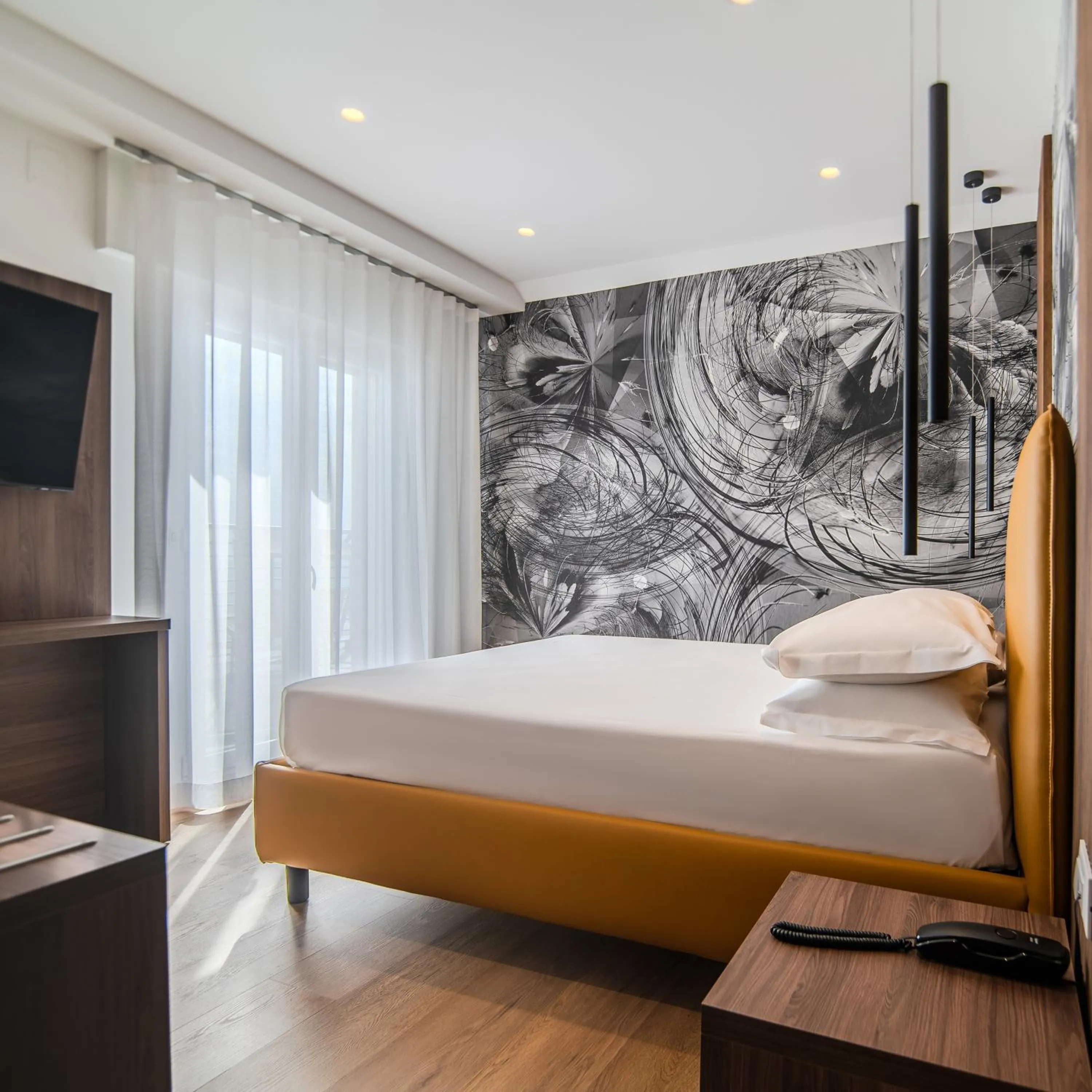 Bed in Hotel Cesare Augustus