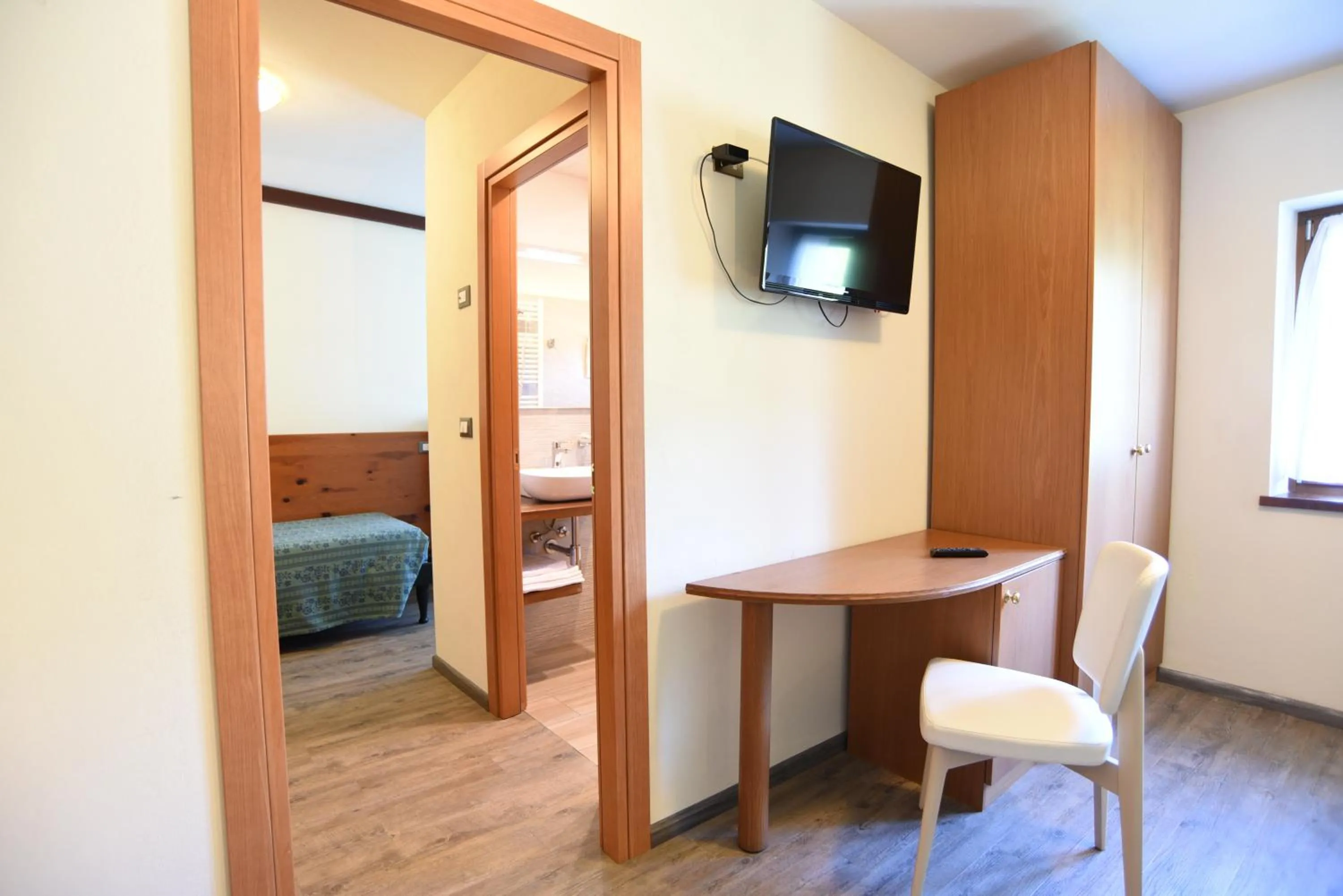 Bed in Albergo Bucaneve