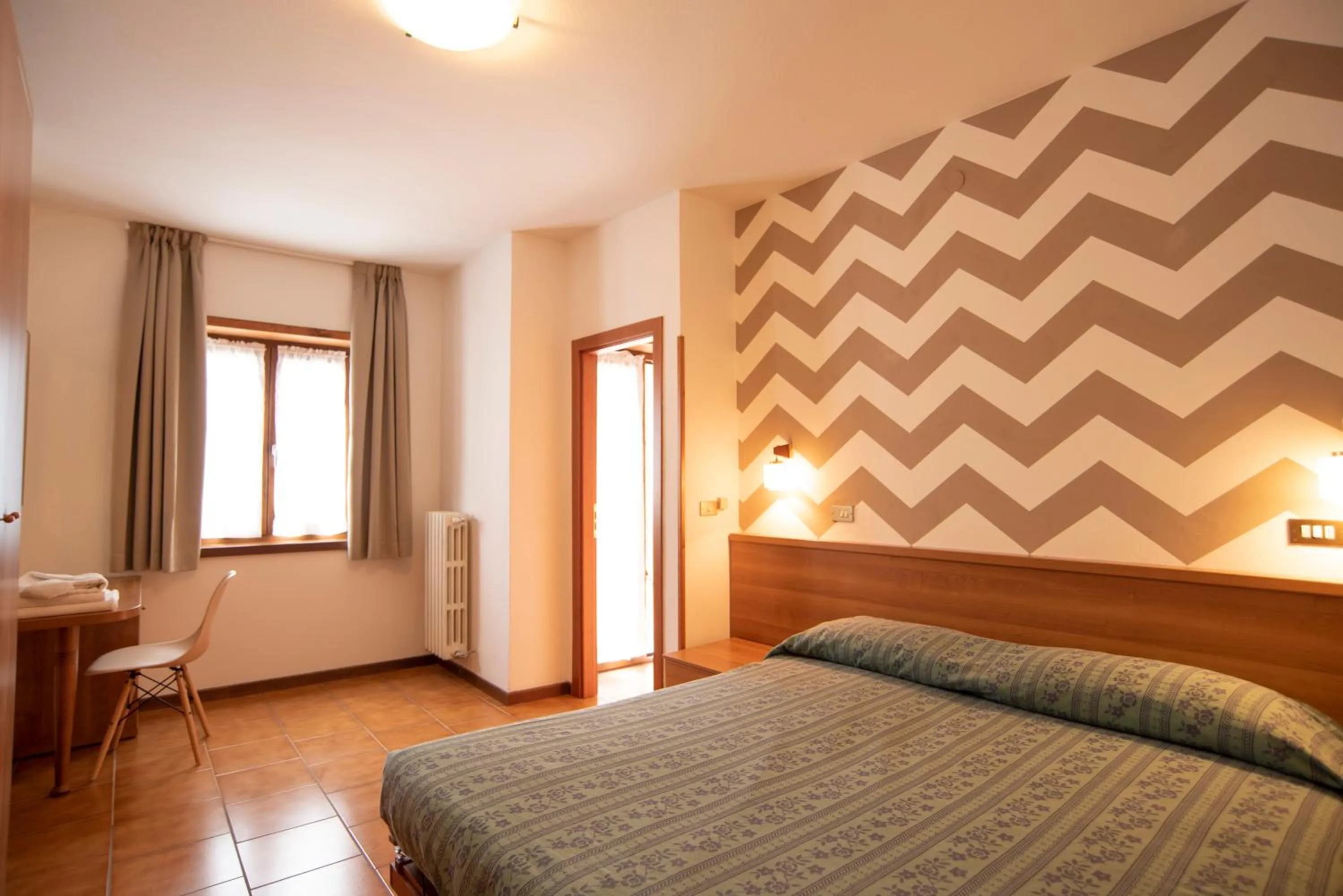 Bed in Albergo Bucaneve