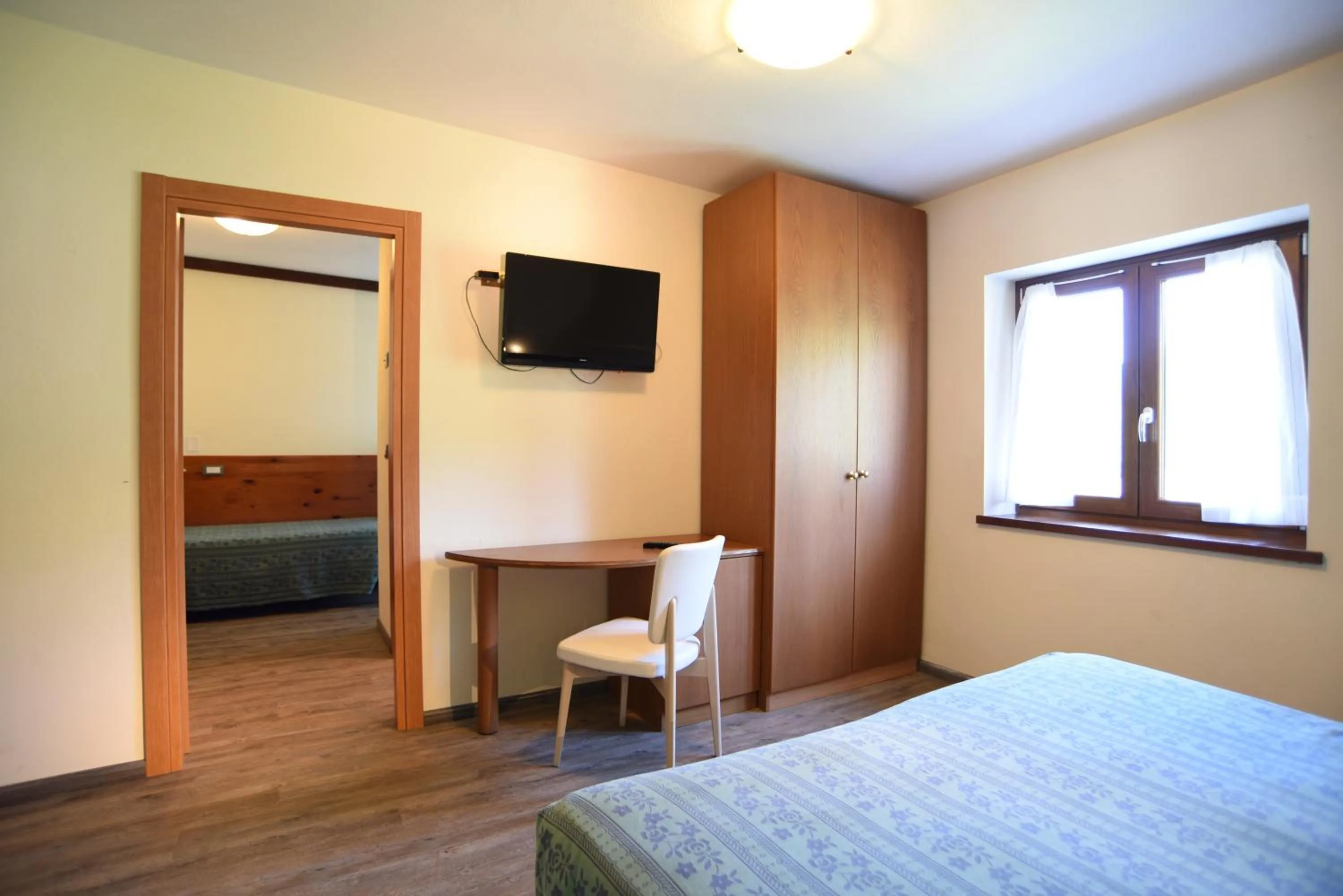 Bed in Albergo Bucaneve