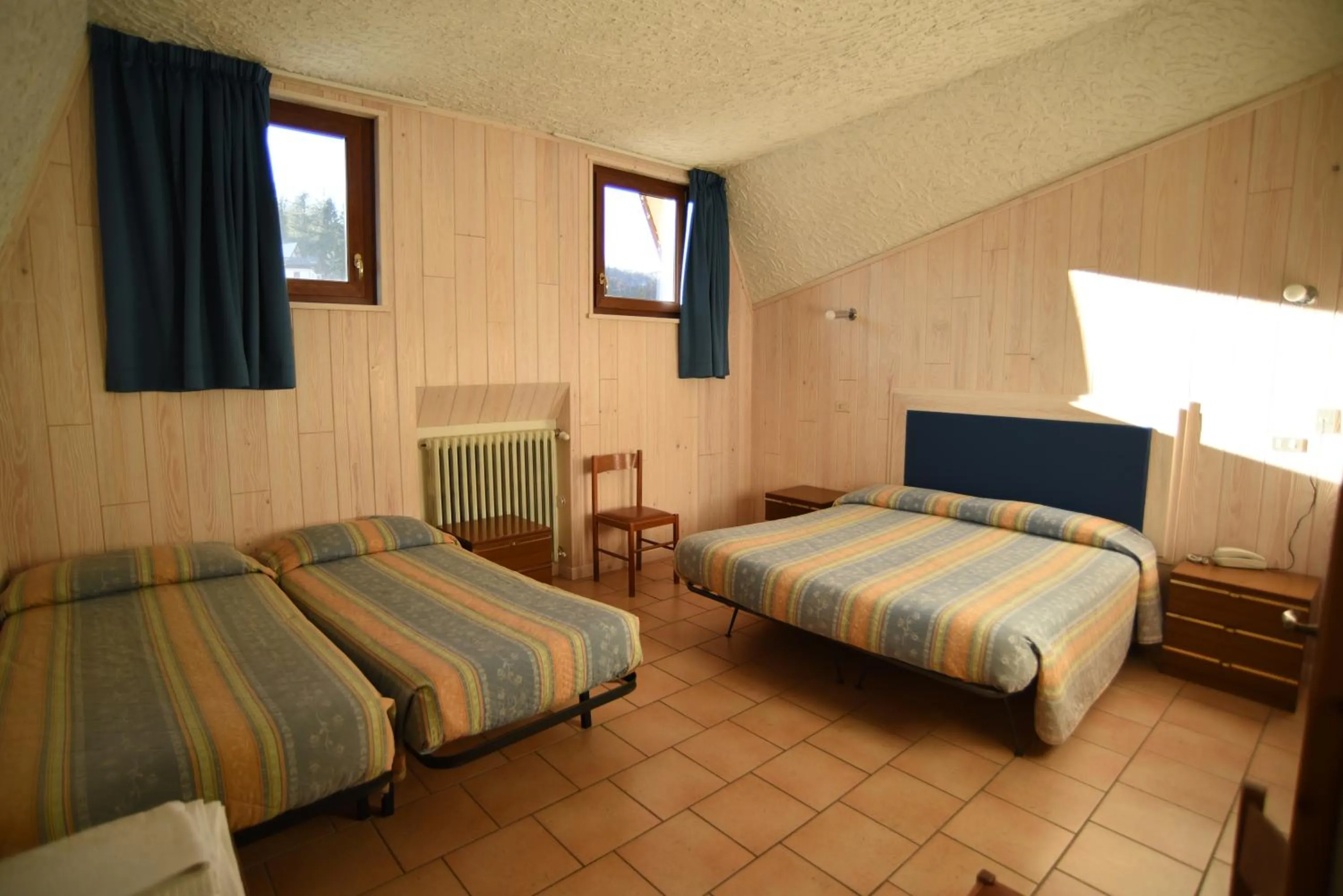 Bed in Albergo Bucaneve