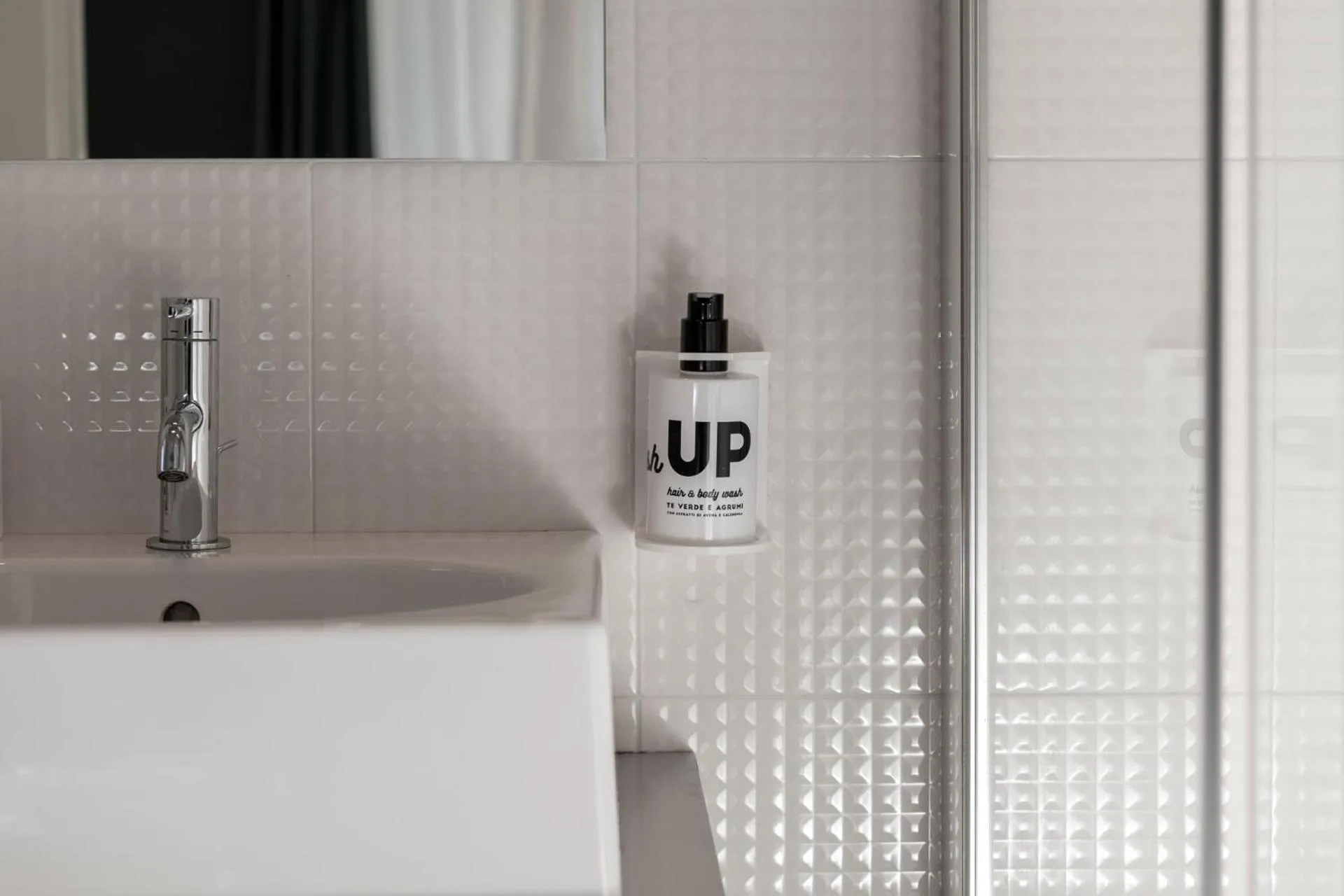 Property logo or sign in Up Hotel