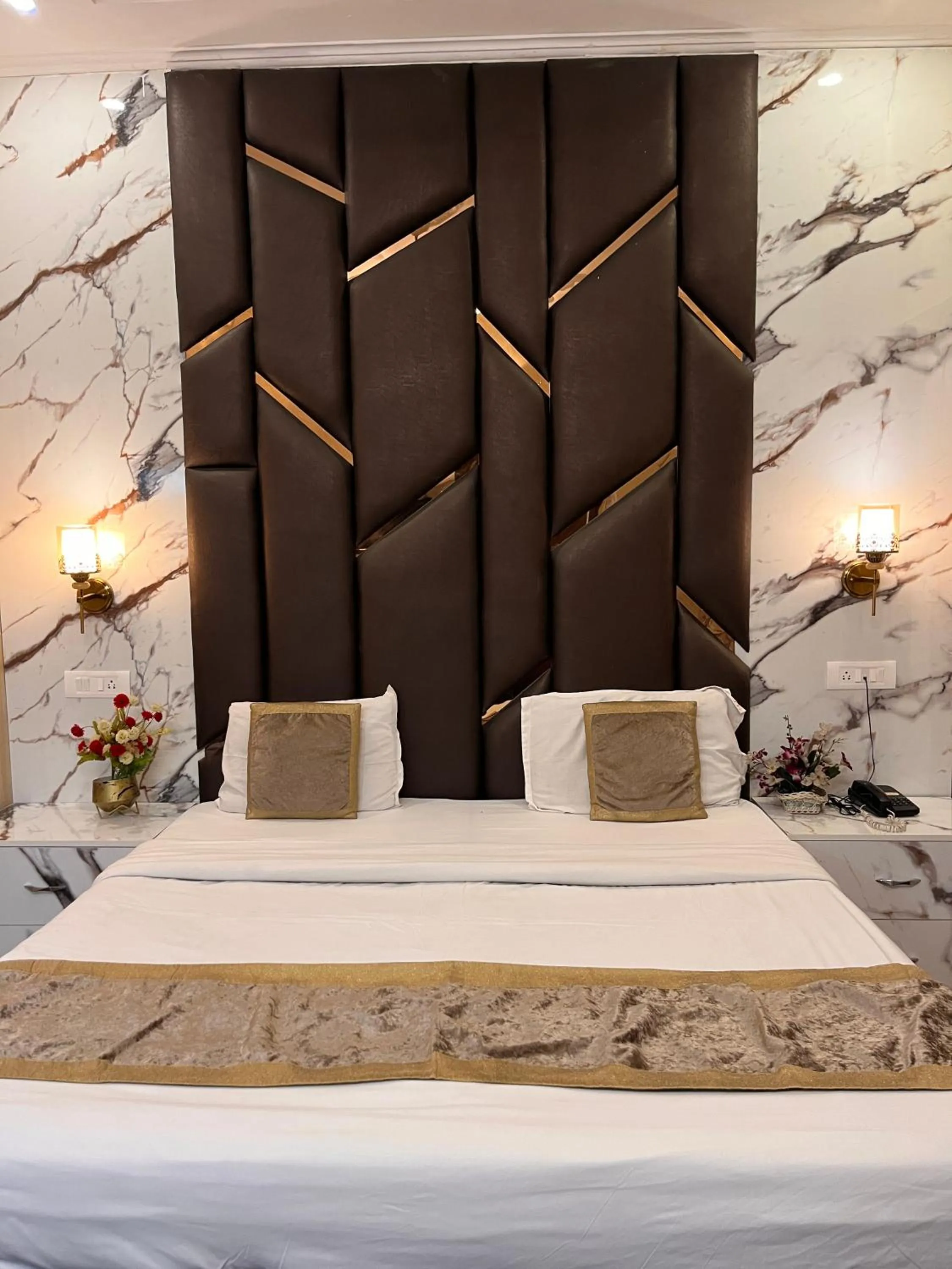 Bed in Hotel Embassy