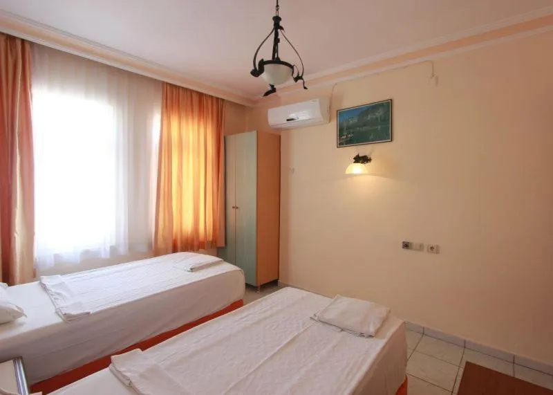 Bed in Damlatas Elegant Apart Hotel