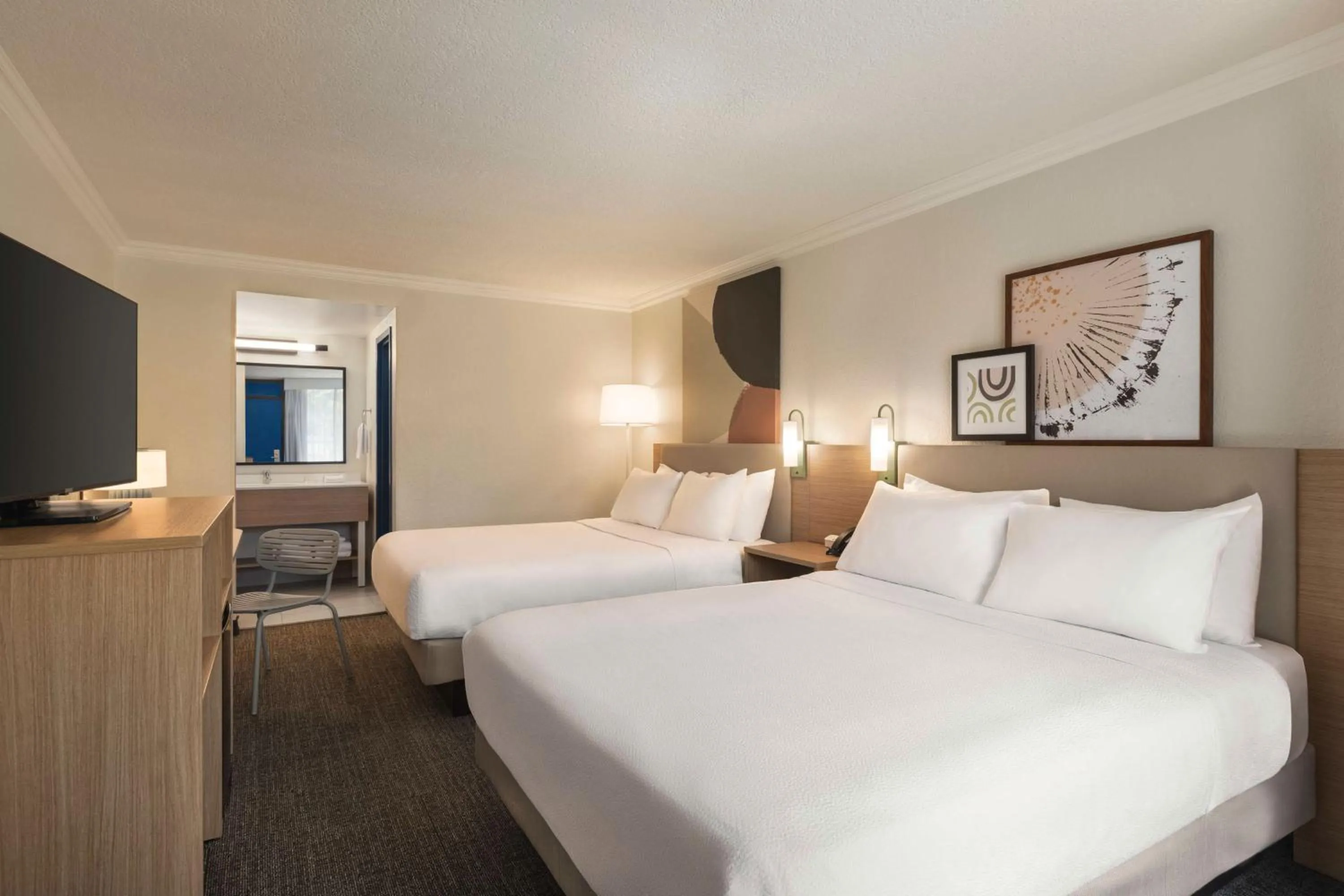 Bed in Spark by Hilton Sarasota Siesta Key Gateway