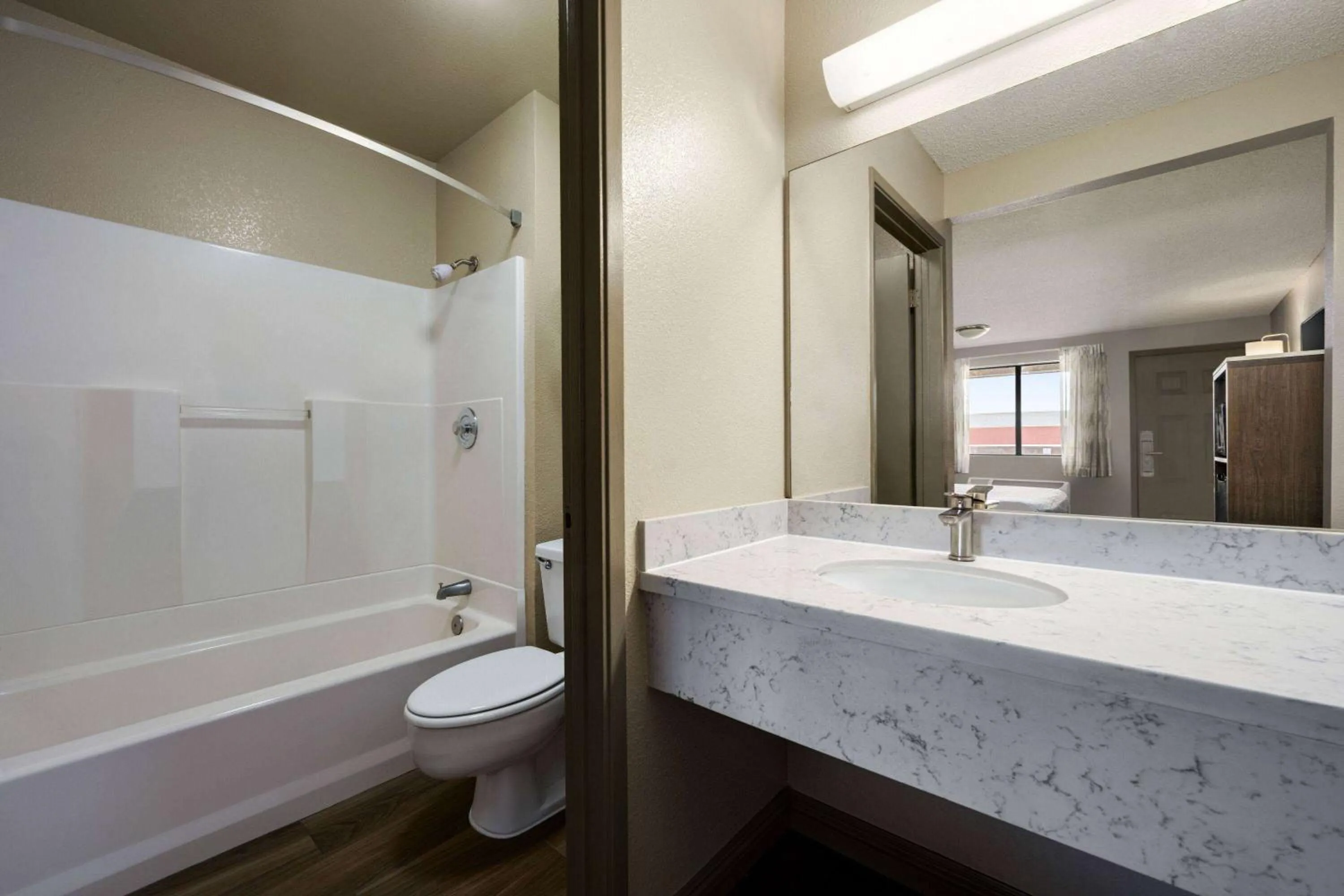 Bathroom in Days Inn by Wyndham Fresno South
