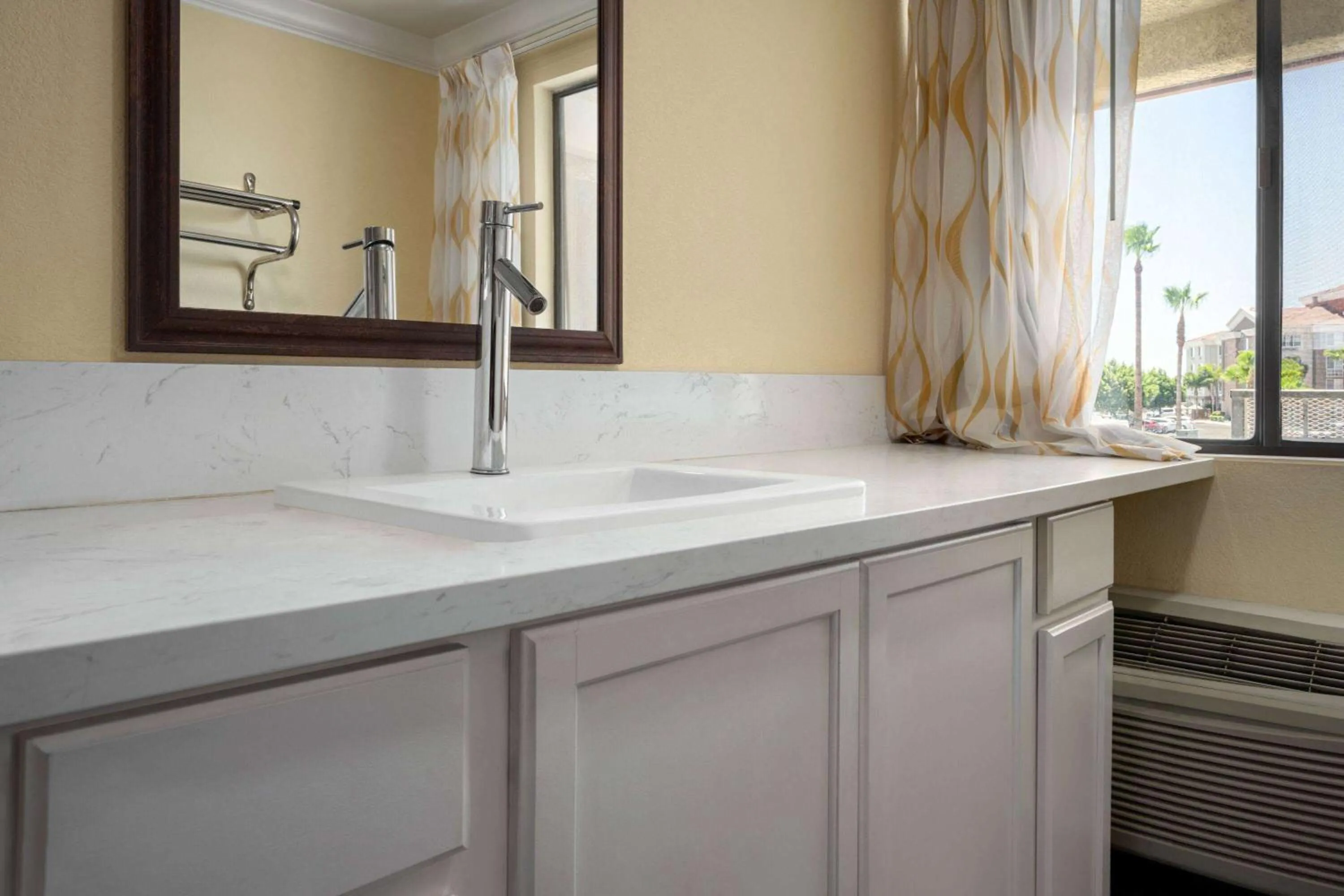 Bathroom in Days Inn by Wyndham Fresno South