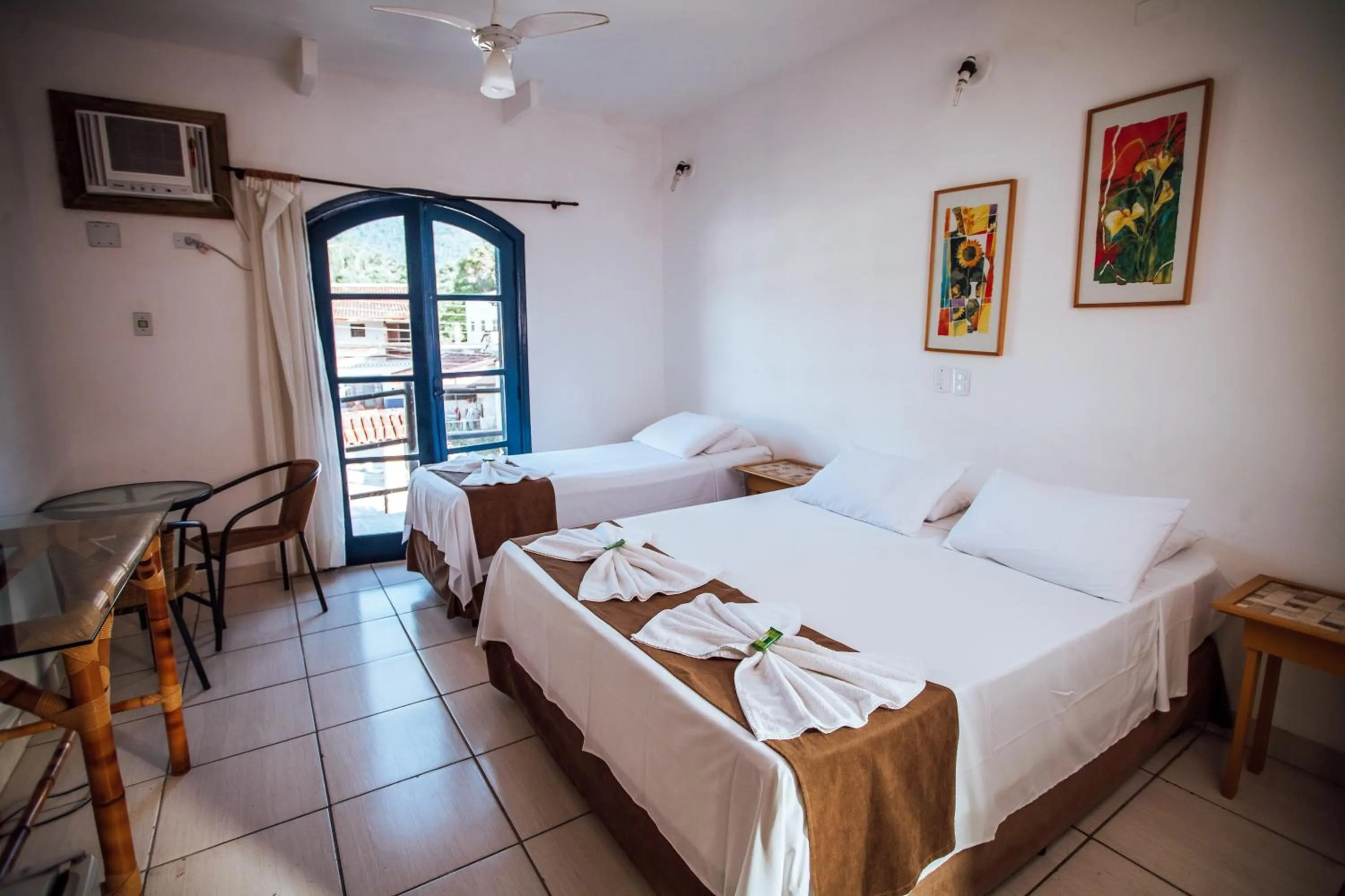 Bed in Pousada Rafimar