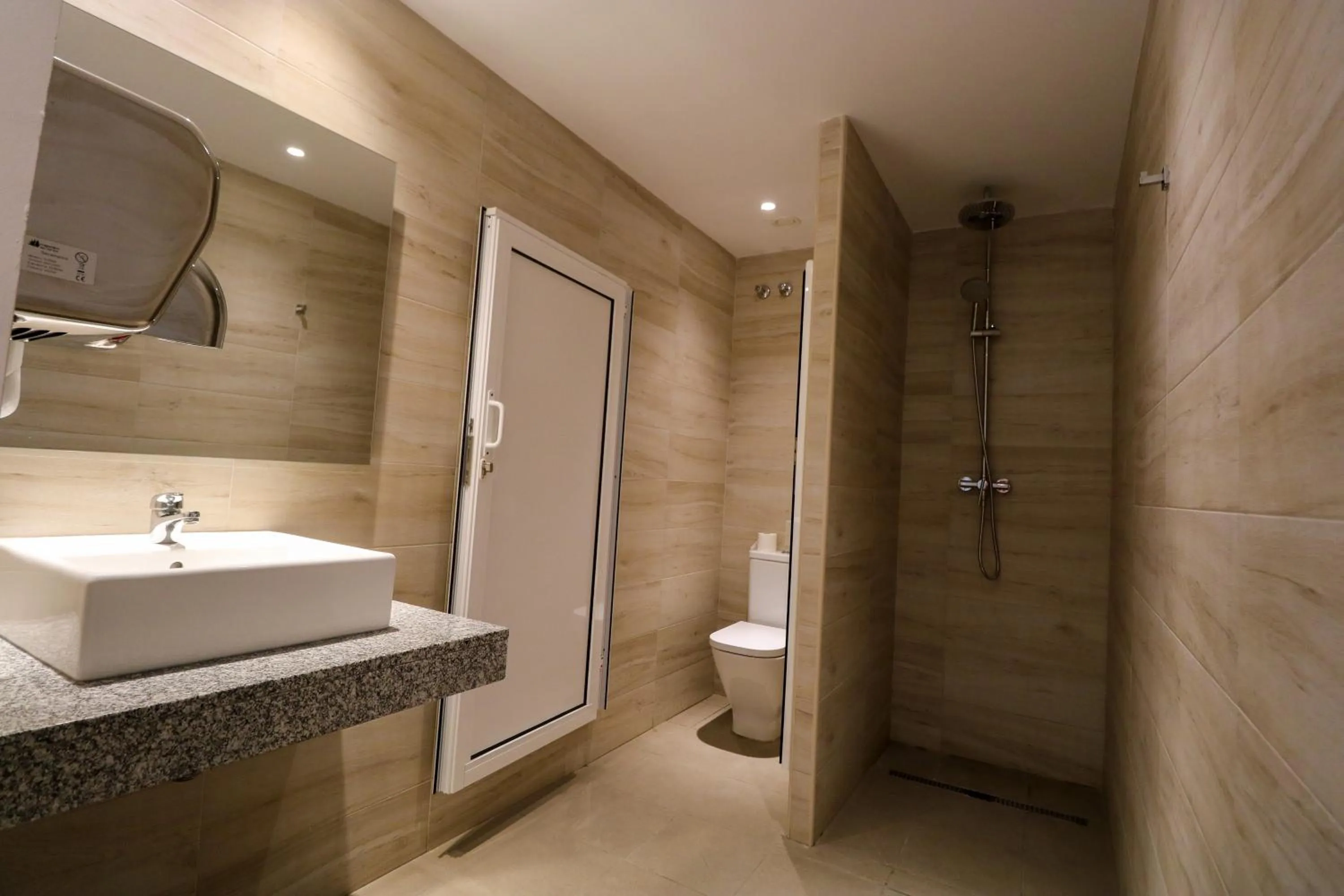 Shower in Calypso Boutique Apartments - Ceased Trading