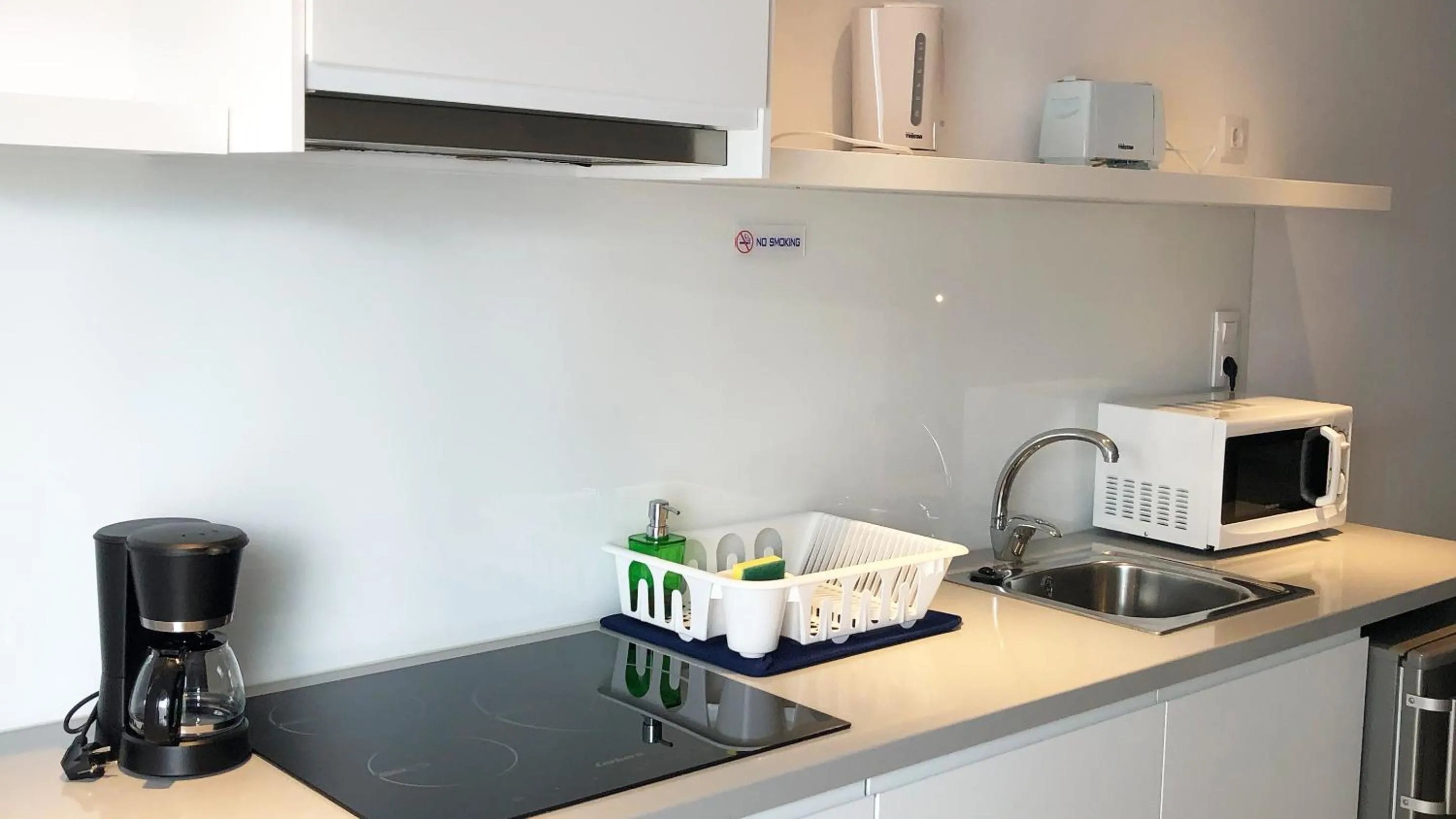 Kitchen or kitchenette in Calypso Boutique Apartments - Ceased Trading