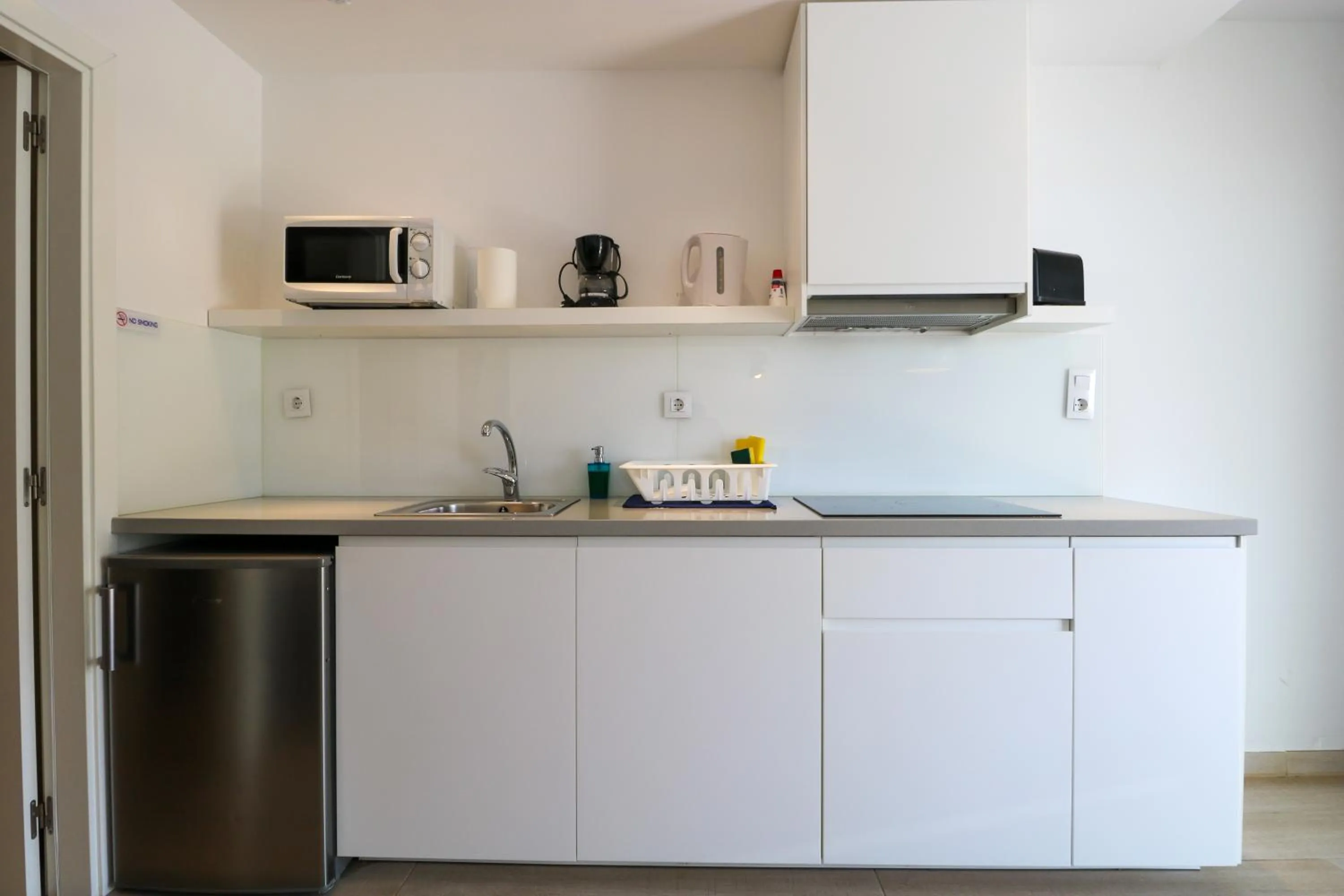 Kitchen or kitchenette in Calypso Boutique Apartments - Ceased Trading