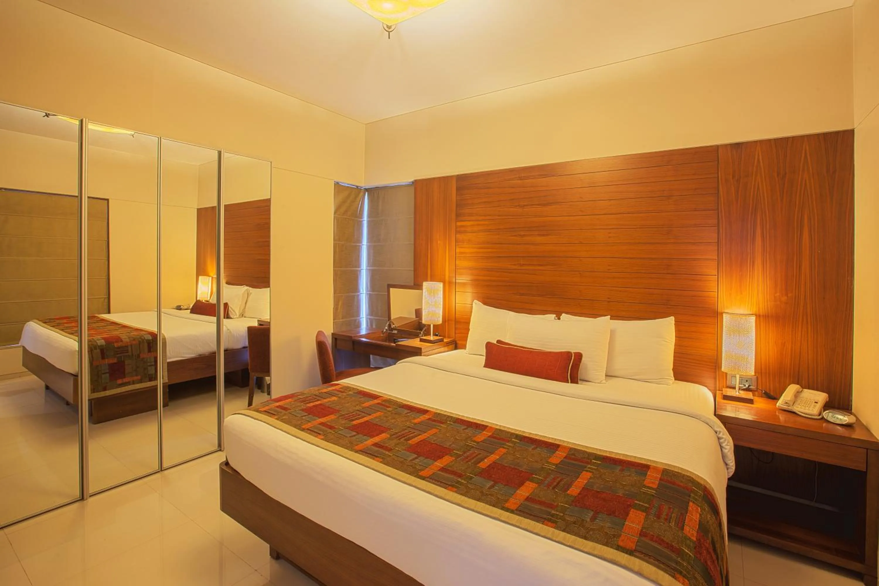 Bedroom, Bed in Oakwood Residence Naylor Road Pune