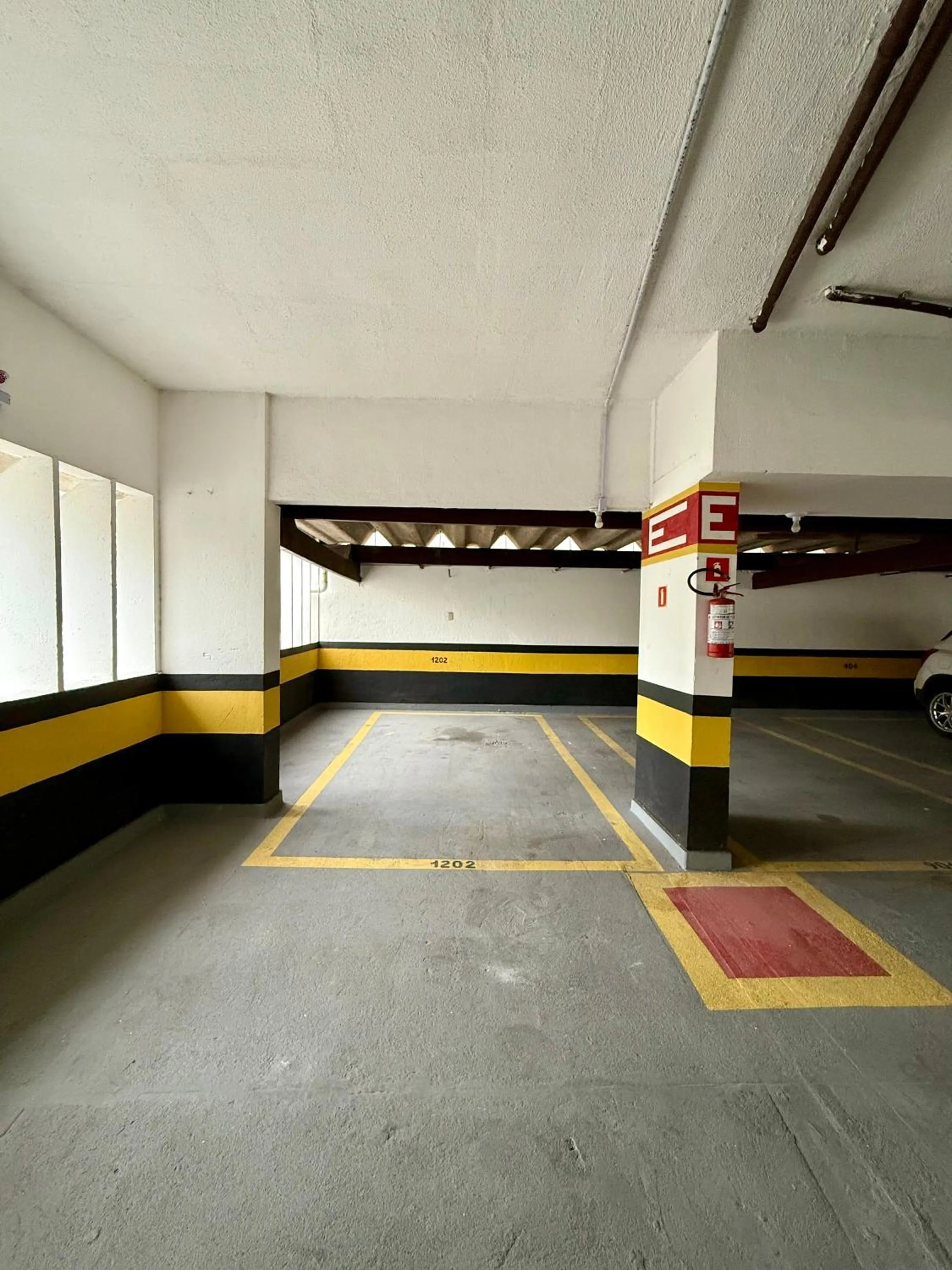 Parking in Quartos em Homestay Praia da Costa