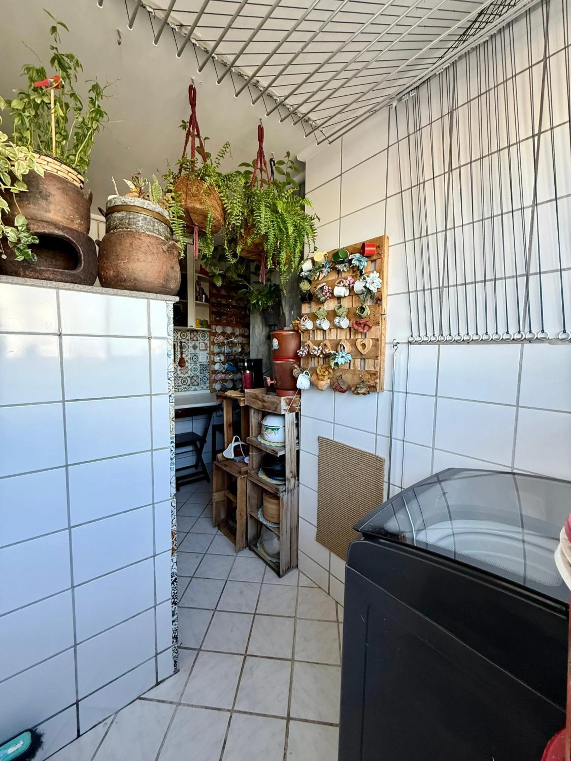 laundry in Quartos em Homestay Praia da Costa