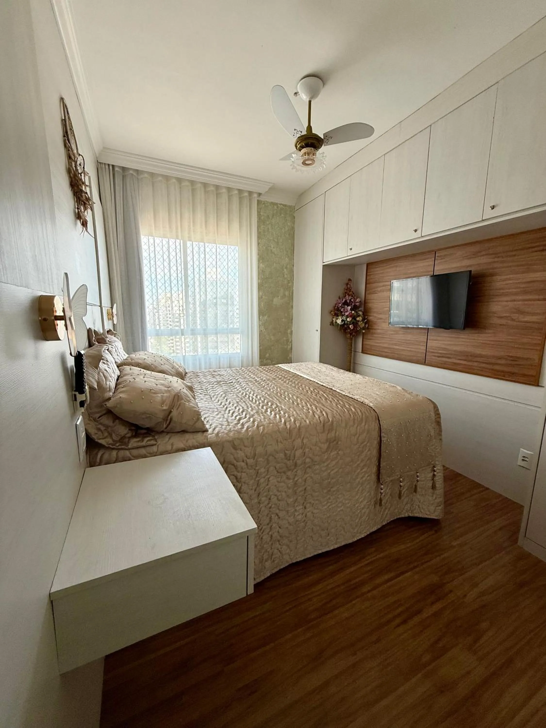 Suite with Air Conditioning in Quartos em Homestay Praia da Costa