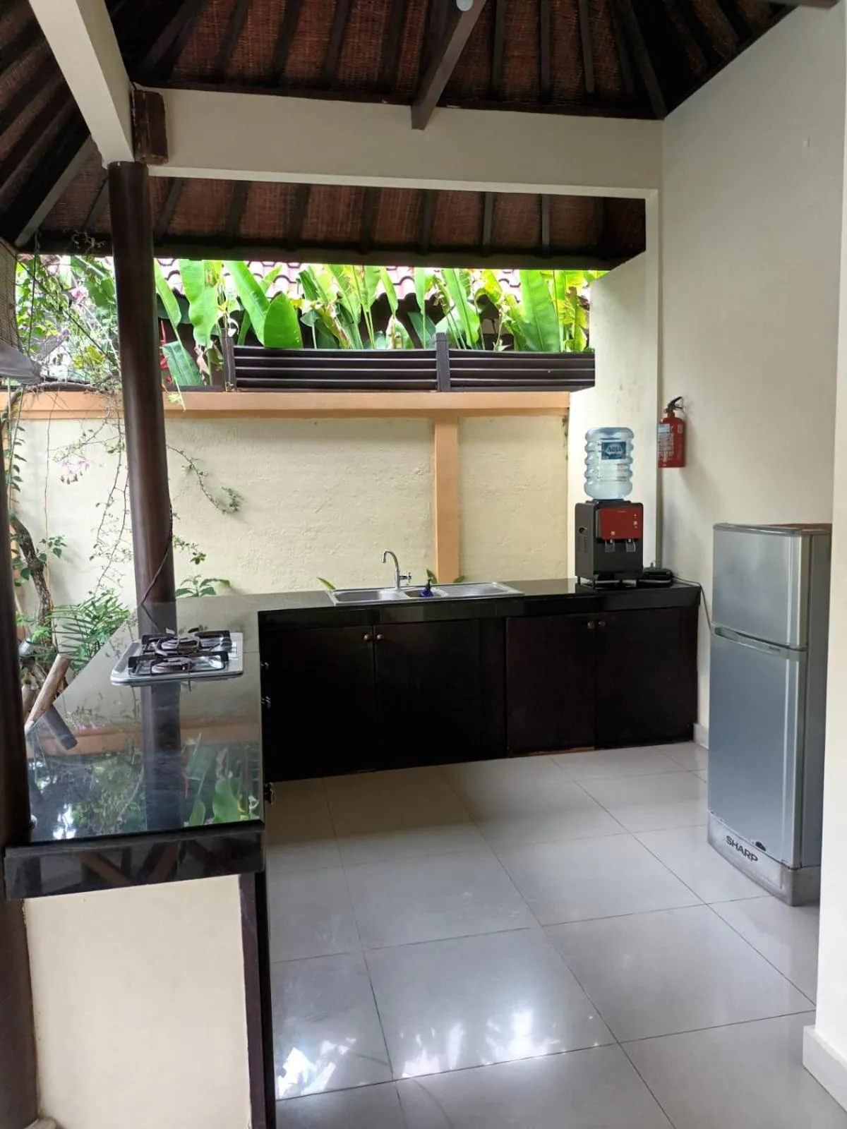 Kitchen or kitchenette in Heliconia Villa